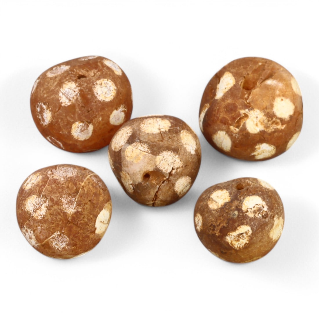 TIBETAN CULTURE: Antique Etched Carnelian Mala Beads (6g, 10-12mm): This set of antique Tibetan mala beads is crafted from etched carnelian, featuring intricate white zigzag and linear patterns that enhance their spiritual significance and aesthetic appeal. These bead