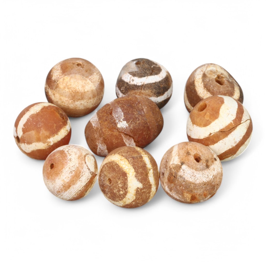 TIBETAN CULTURE: Antique Etched Carnelian Mala Beads (11g, 10-12mm): This set of antique Tibetan mala beads is crafted from etched carnelian, featuring intricate white zigzag and linear patterns that enhance their spiritual significance and aesthetic appeal. These bead