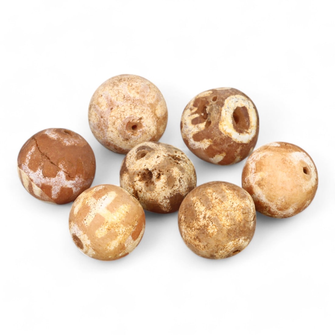 TIBETAN CULTURE: Antique Etched Carnelian Mala Beads (9g, 10-12mm): This set of antique Tibetan mala beads is crafted from etched carnelian, featuring intricate white zigzag and linear patterns that enhance their spiritual significance and aesthetic appeal. These bead