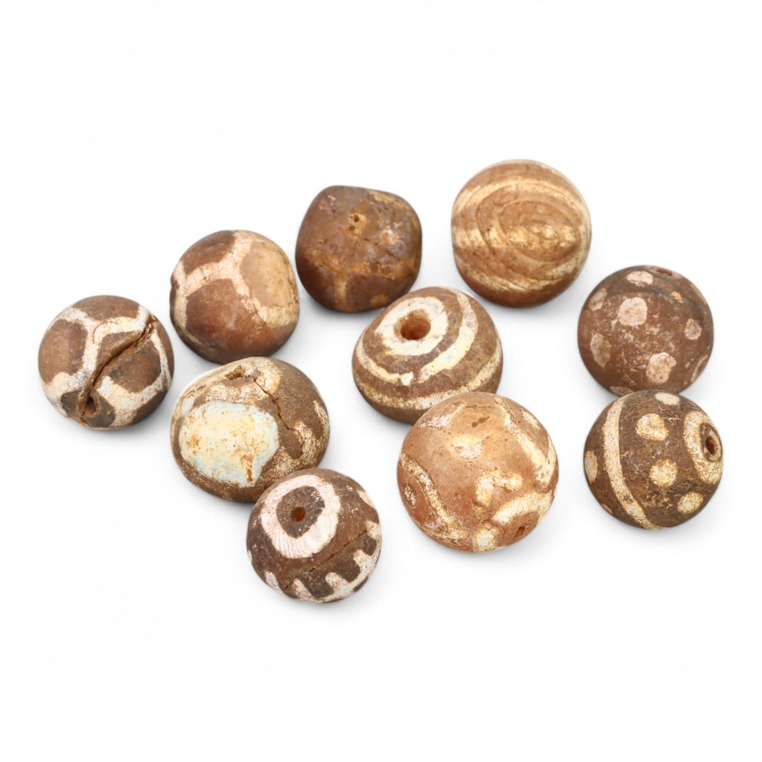 TIBETAN CULTURE: Antique Etched Carnelian Mala Beads (18g, 10-12mm): This set of antique Tibetan mala beads is crafted from etched carnelian, featuring intricate white zigzag and linear patterns that enhance their spiritual significance and aesthetic appeal. These bead