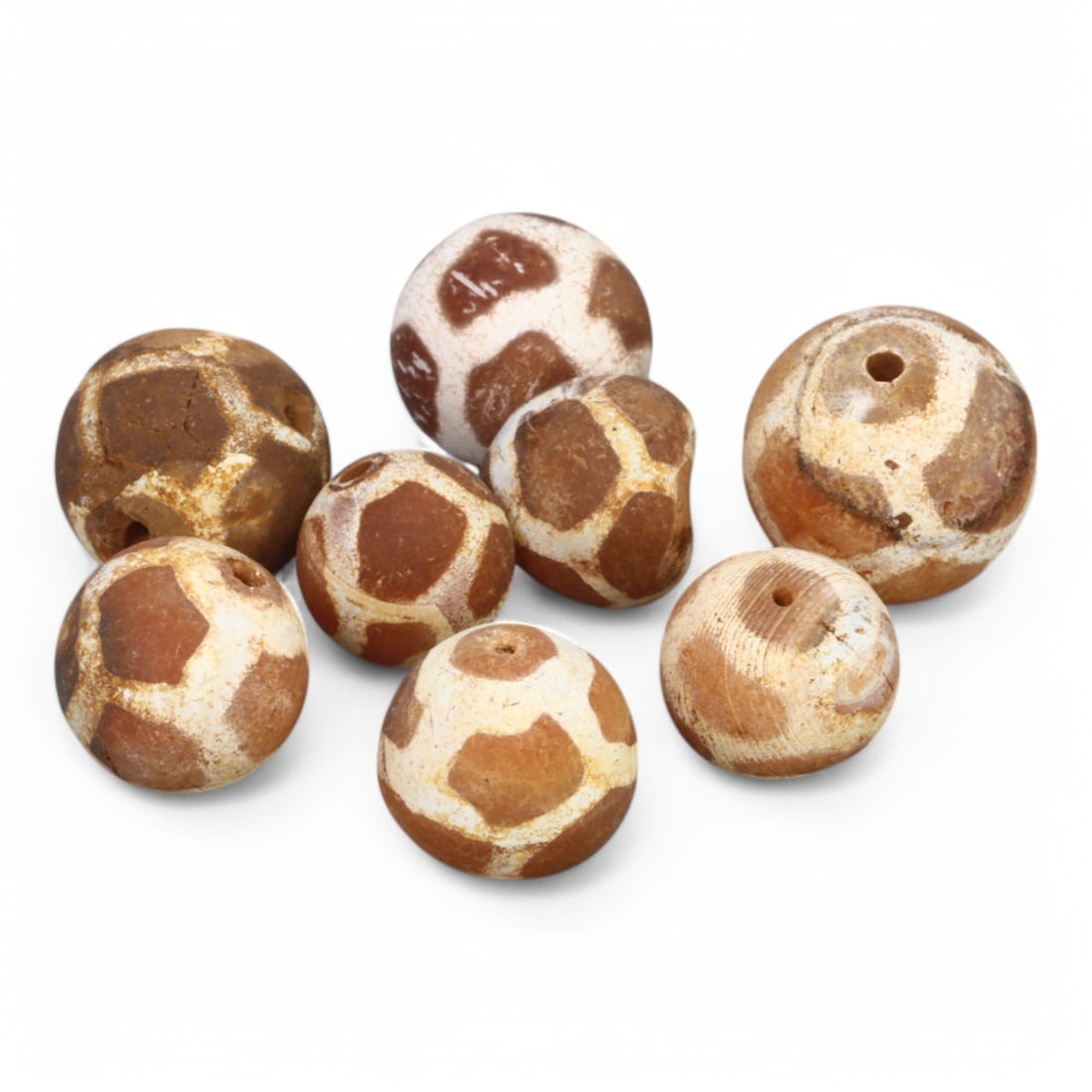 TIBETAN CULTURE: Antique Etched Carnelian Mala Beads (10g, 10-12mm): This set of antique Tibetan mala beads is crafted from etched carnelian, featuring intricate white zigzag and linear patterns that enhance their spiritual significance and aesthetic appeal. These bead