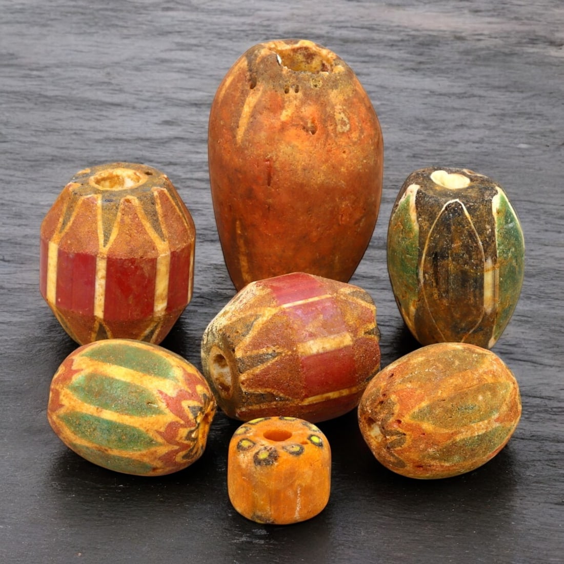 AFRICAN: Antique Chevron and Trade Beads, (130g, 12-42mm): This remarkable lot features African antique chevron and trade beads, weighing a total of 130 grams with individual beads ranging from 12 to 42mm in size. These beads display a striking variety of sha