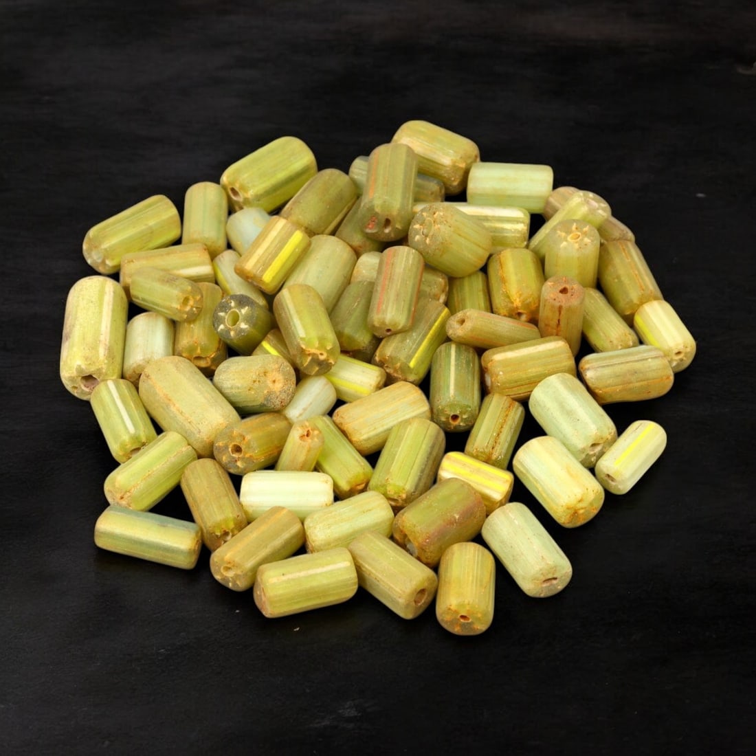 VENETIAN: Antique Millefiori Trade Beads, (46g, 1-2cm): This exceptional lot features Venetian antique millefiori trade beads, weighing a total of 46 grams with individual beads measuring between 1 and 2cm in size. These vibrant, cylindrical beads showcase