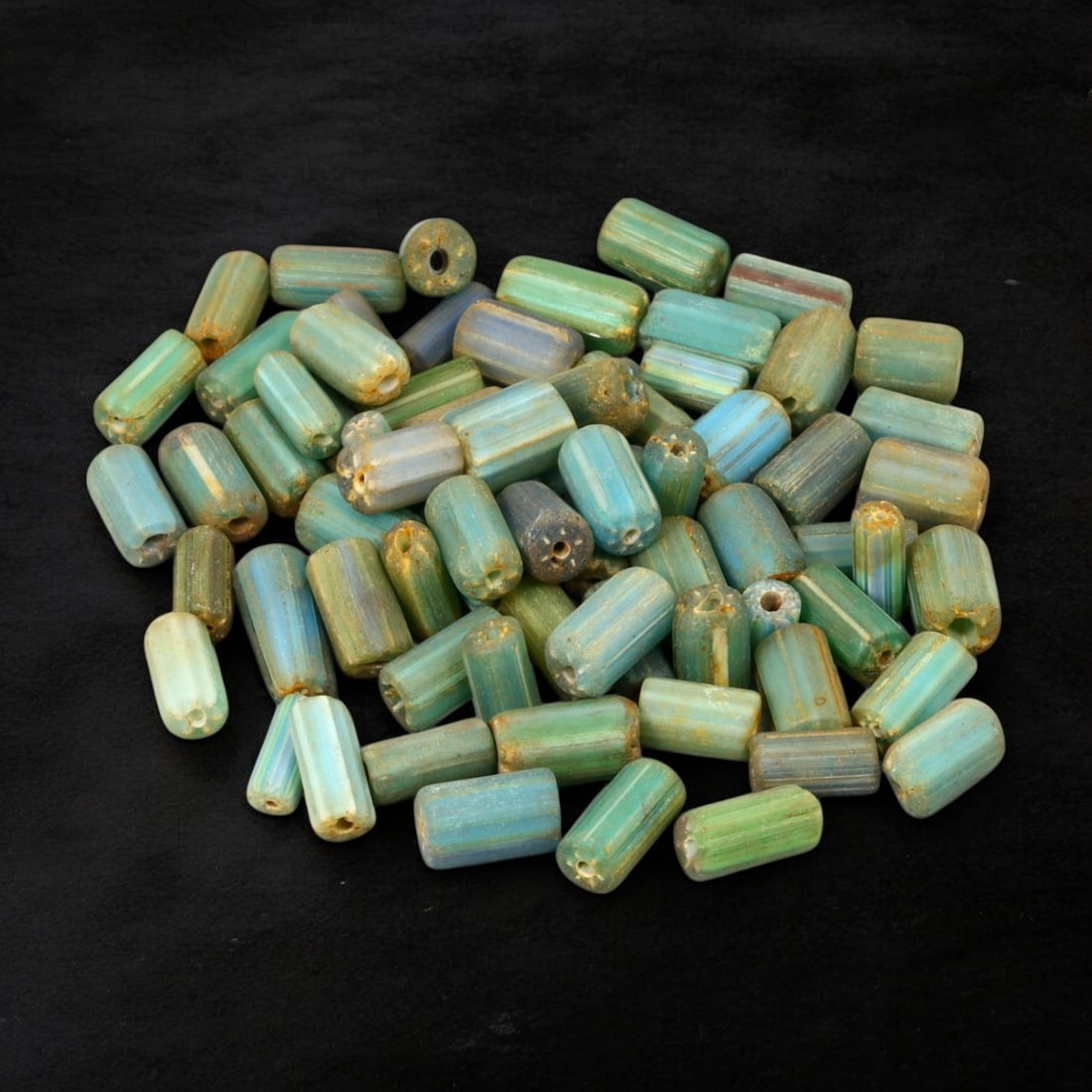 VENETIAN: Antique Millefiori Trade Beads, (48g, 1-2cm): This exceptional lot features Venetian antique millefiori trade beads, weighing a total of 48 grams with individual beads measuring between 1 and 2cm in size. These vibrant, cylindrical beads showcase