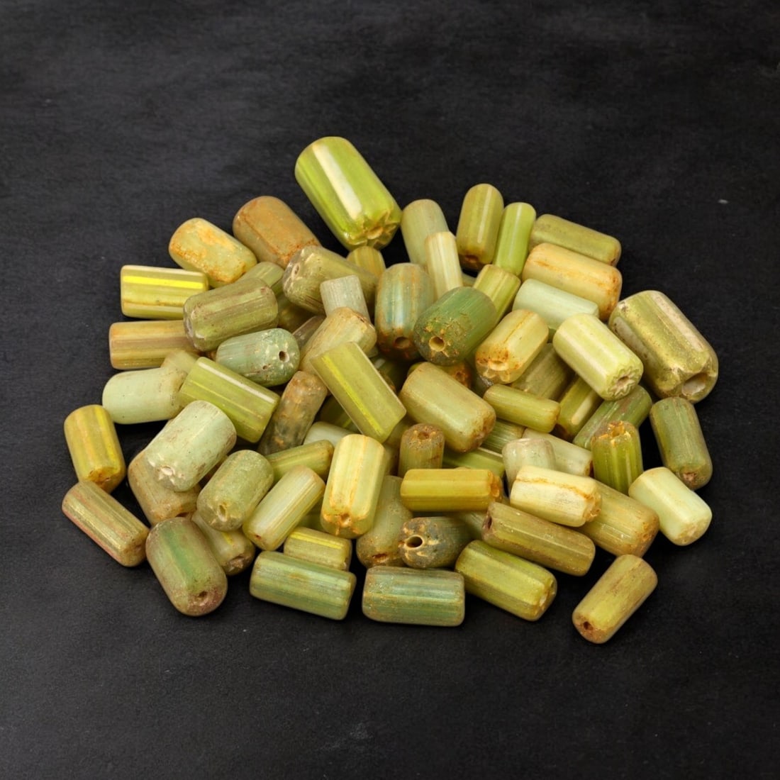 VENETIAN: Antique Millefiori Trade Beads, (52g, 1-2cm): This exceptional lot features Venetian antique millefiori trade beads, weighing a total of 52 grams with individual beads measuring between 1 and 2cm in size. These vibrant, cylindrical beads showcase