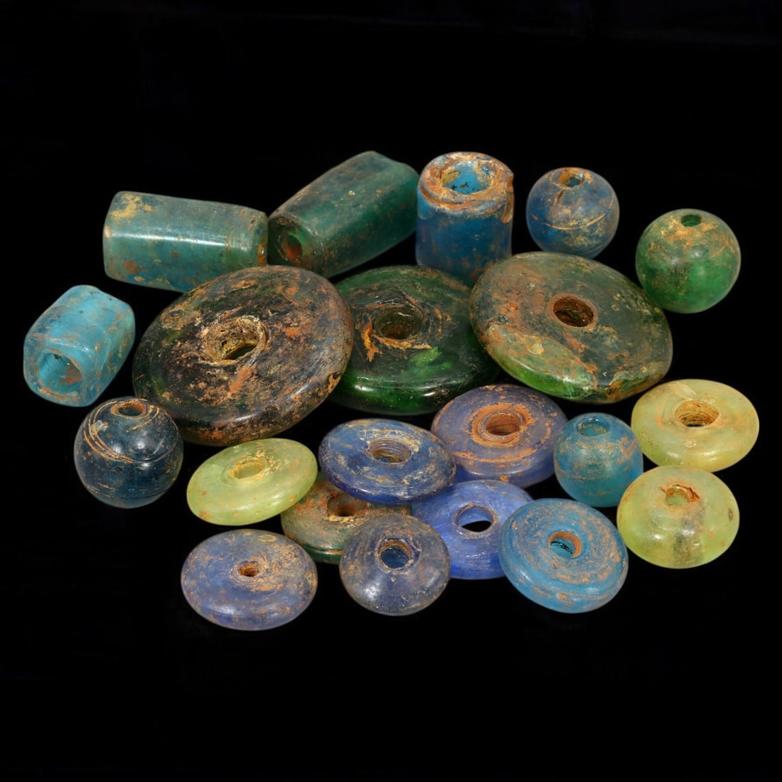 AFRICAN: Antique Blue and Green Glass Trade Beads, (113g, 2-4cm): This vibrant lot features African antique blue and green glass trade beads, with a total weight of 113 grams and individual bead sizes ranging from 2 to 4 cm. The collection showcases an array of disc