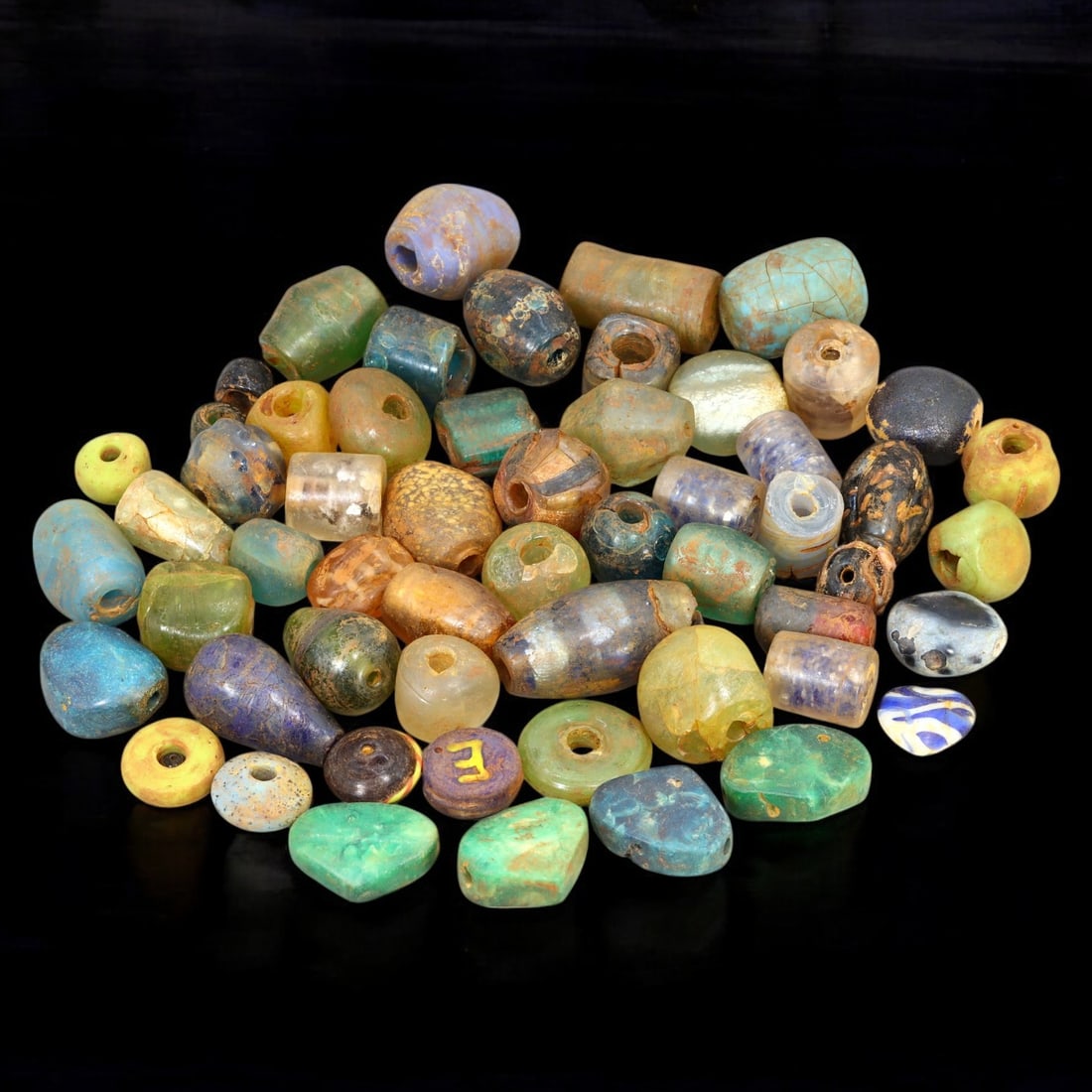 AFRICAN: Antique Mixed Glass Trade Beads, (263g, 1-3cm): This captivating lot features African antique mixed glass trade beads, with a total weight of 263 grams and individual bead sizes ranging from 1 to 3 cm. The collection showcases an eclectic variety o