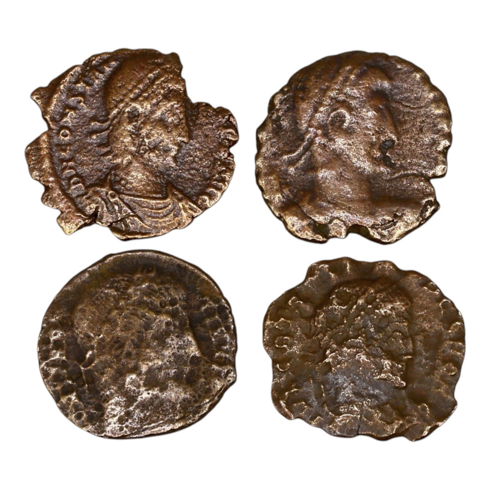 LOT OF 4 ANCIENT ROMAN IMPERIAL BRONZE COINS, 15-17mm, 7.9g: This set of Roman Imperial bronze coins showcases the diversity of coinage issued under various emperors. The obverses typically feature imperial portraits, emphasizing the authority and divine status
