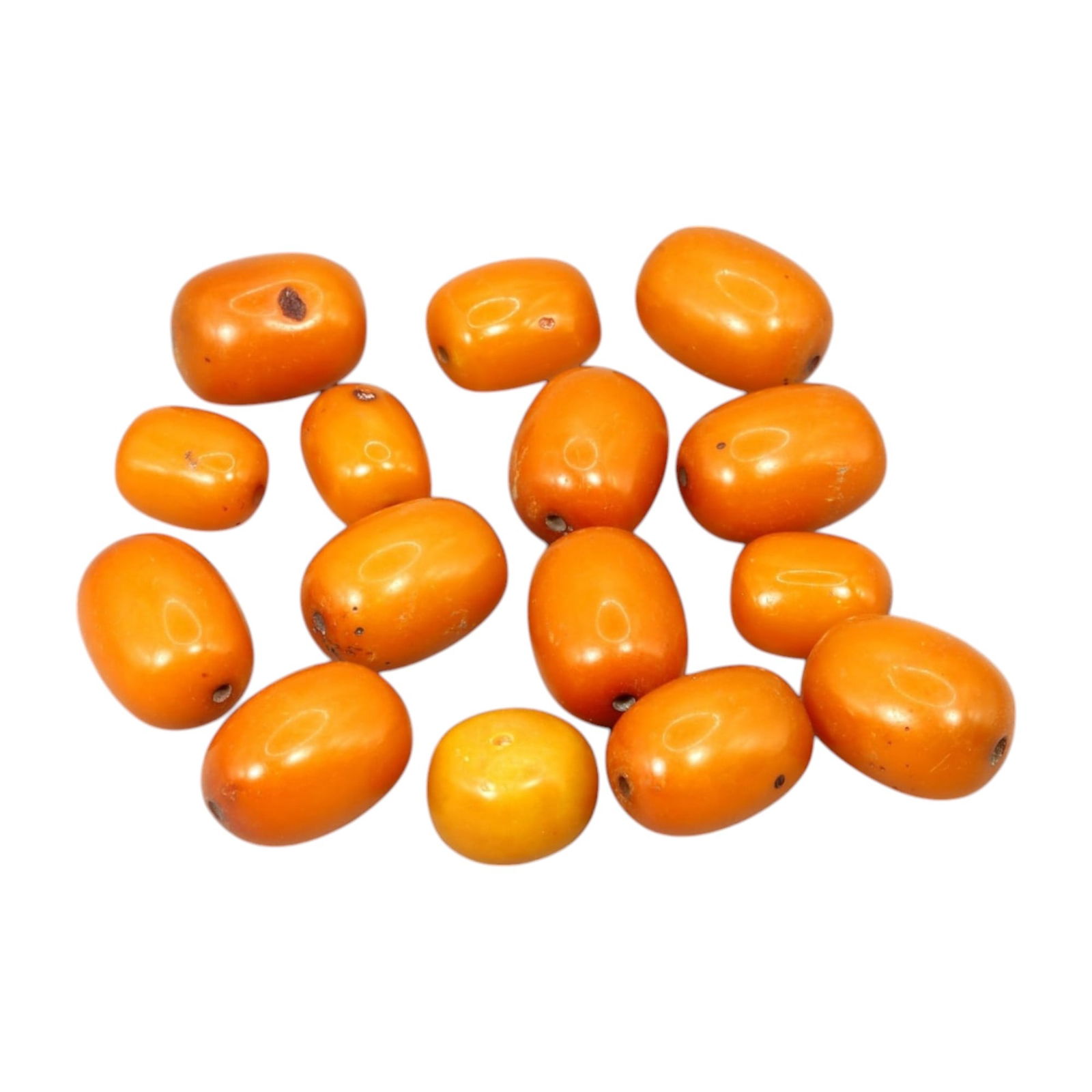 AFRICAN: Antique Amber Resin Beads, (73g, 2.5cm): This striking lot features African antique amber resin beads, weighing a total of 73 grams with individual beads measuring approximately 2.5cm in size. These warm-hued, barrel-shaped beads display a r