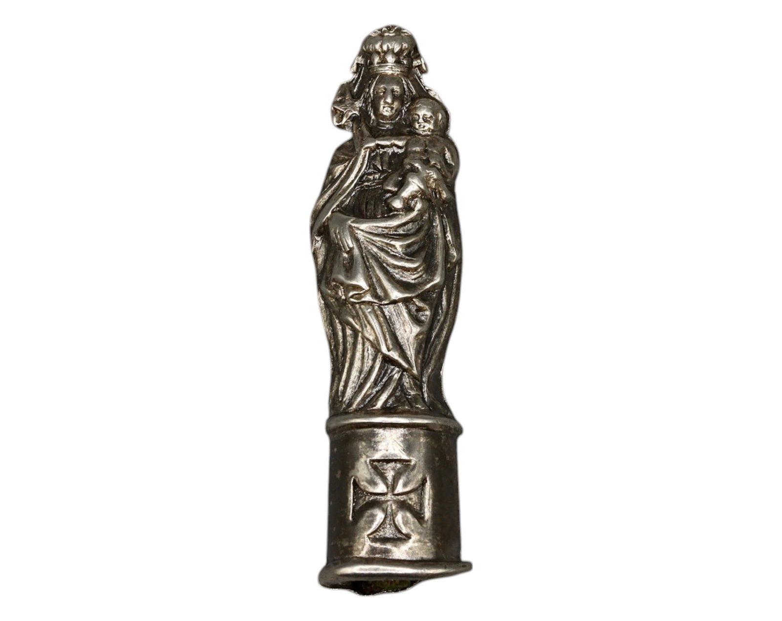 MEDIEVAL EUROPE: Silver Virgin & Child Figure with Cross Base: A finely crafted medieval silver miniature, depicting the Virgin Mary holding the Christ Child, standing atop a cylindrical base adorned with a cross motif. The delicate drapery and facial features su