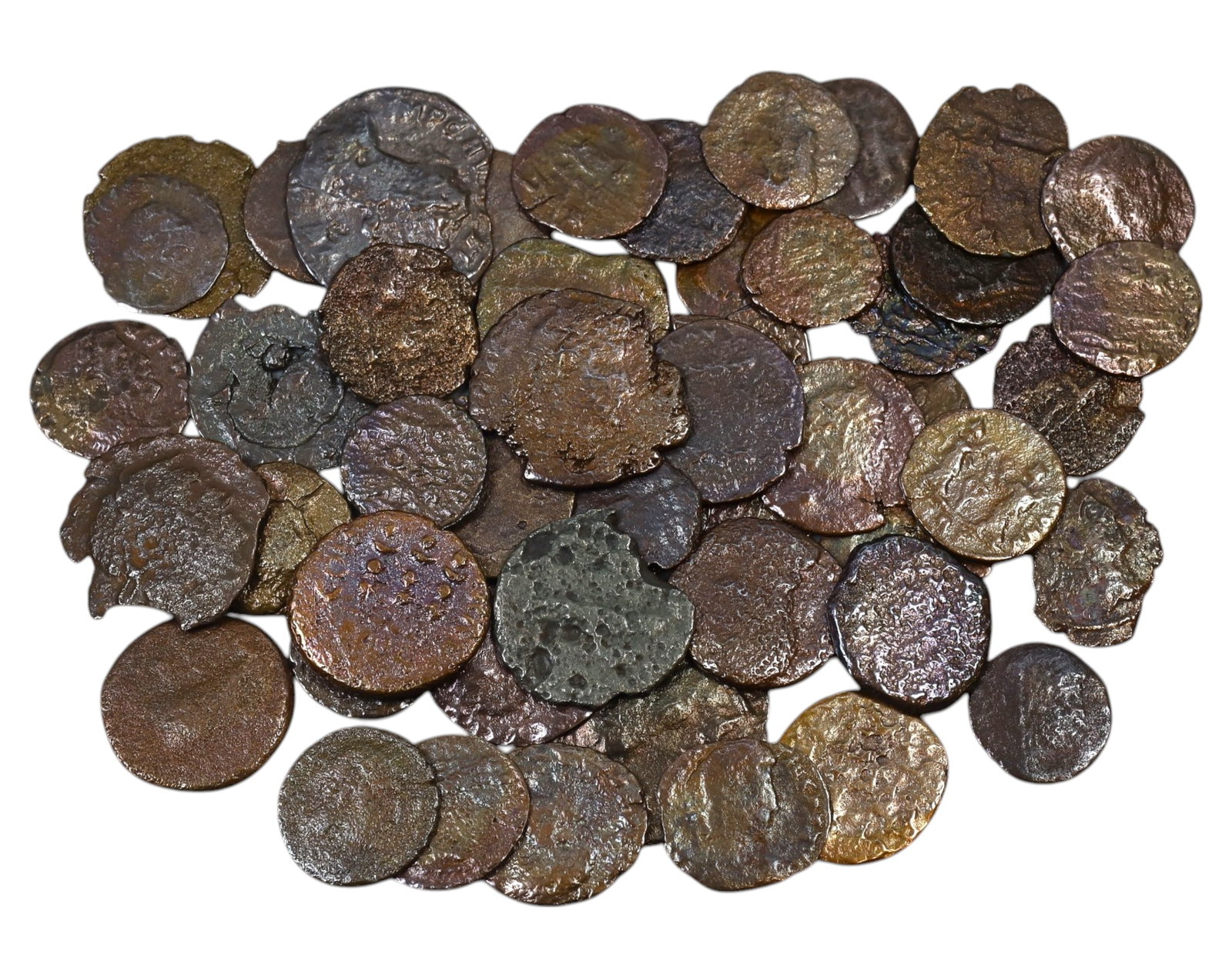 ANCIENT ROME/BYZANTINE: Lot of 50 AE Bronze Coins, 65g, 1-2.5cm: An intriguing lot of AE bronze coins from the late Roman and early Byzantine periods. These diminutive nummi and folles circulated during times of great transition, from the crisis of the late Roman E