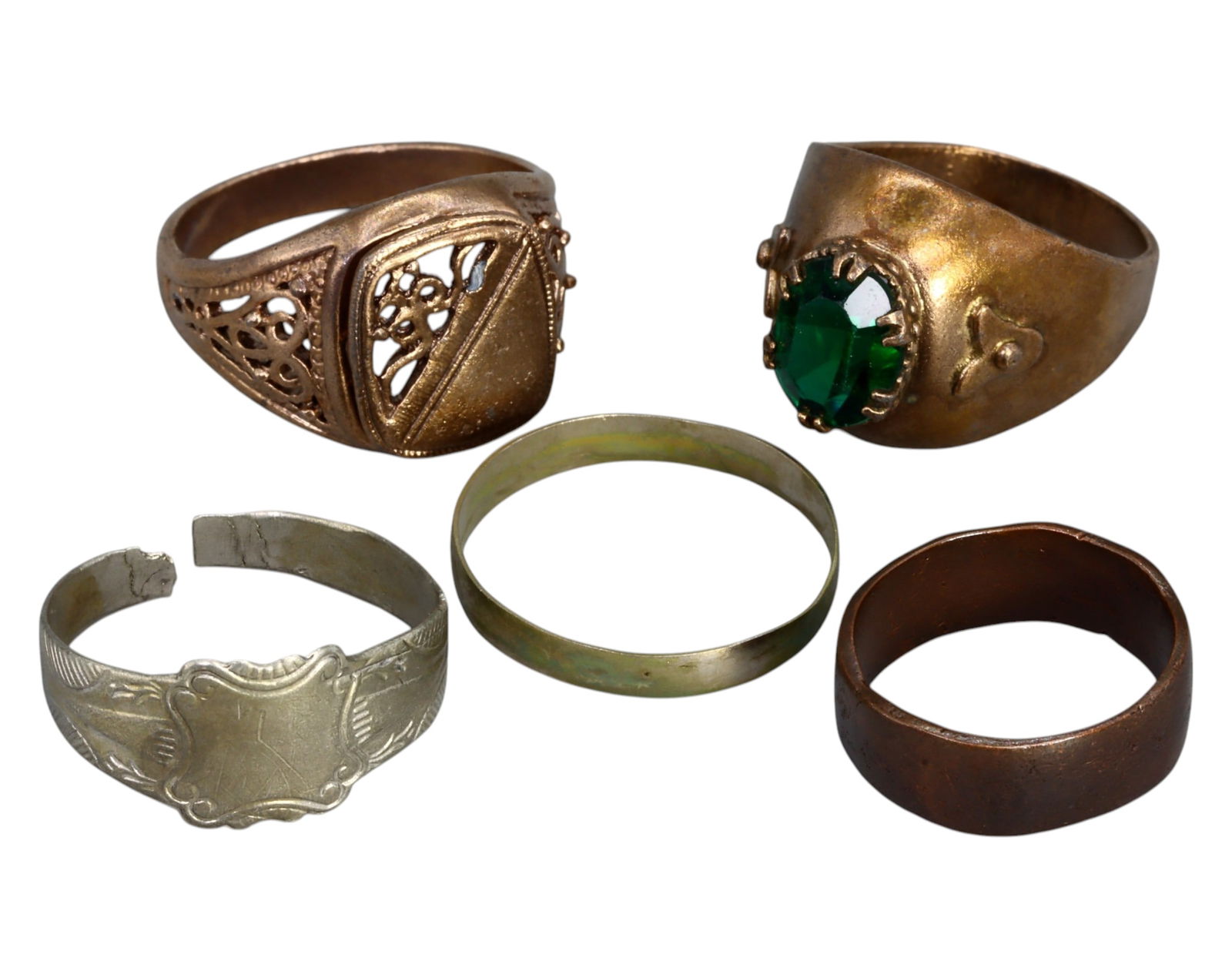 EUROPE: Mixed Metal Rings - Bronze & Silver, Ornate & Plain Designs, 19th-20th Century: A diverse set of five rings crafted in bronze and silver, ranging in sizes 5.5 to 10 US, showcasing a blend of ornate craftsmanship and simple utilitarian styles. Two rings feature intricate filigree