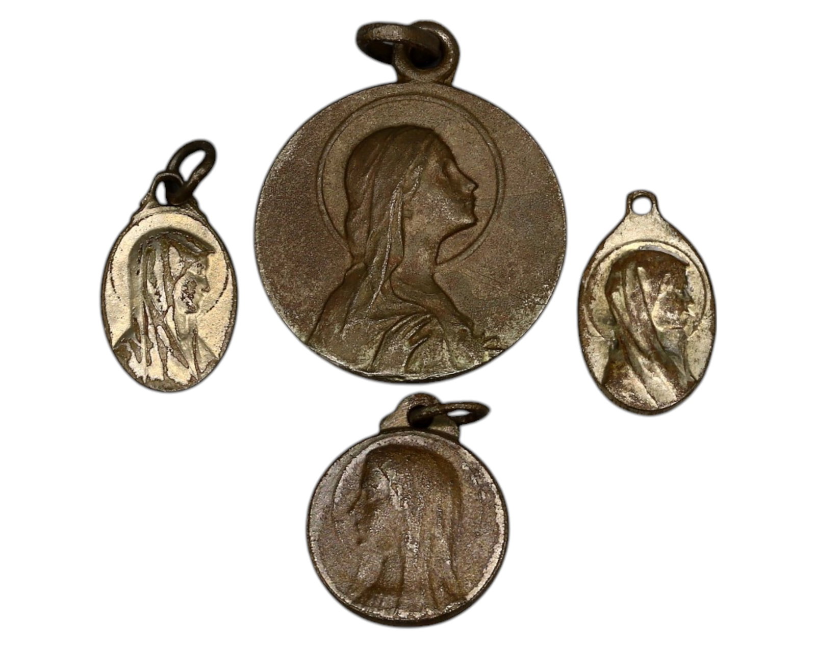 SPAIN/FRANCE: Set of Four Marian Devotional Medals - Virgin Mary & Lourdes, 19th-20th Century: A set of four religious devotional medals, measuring 1.5 to 2.4 cm and weighing 6.2g, featuring classic depictions of the Virgin Mary and Our Lady of Lourdes. The collection includes two oval medals p