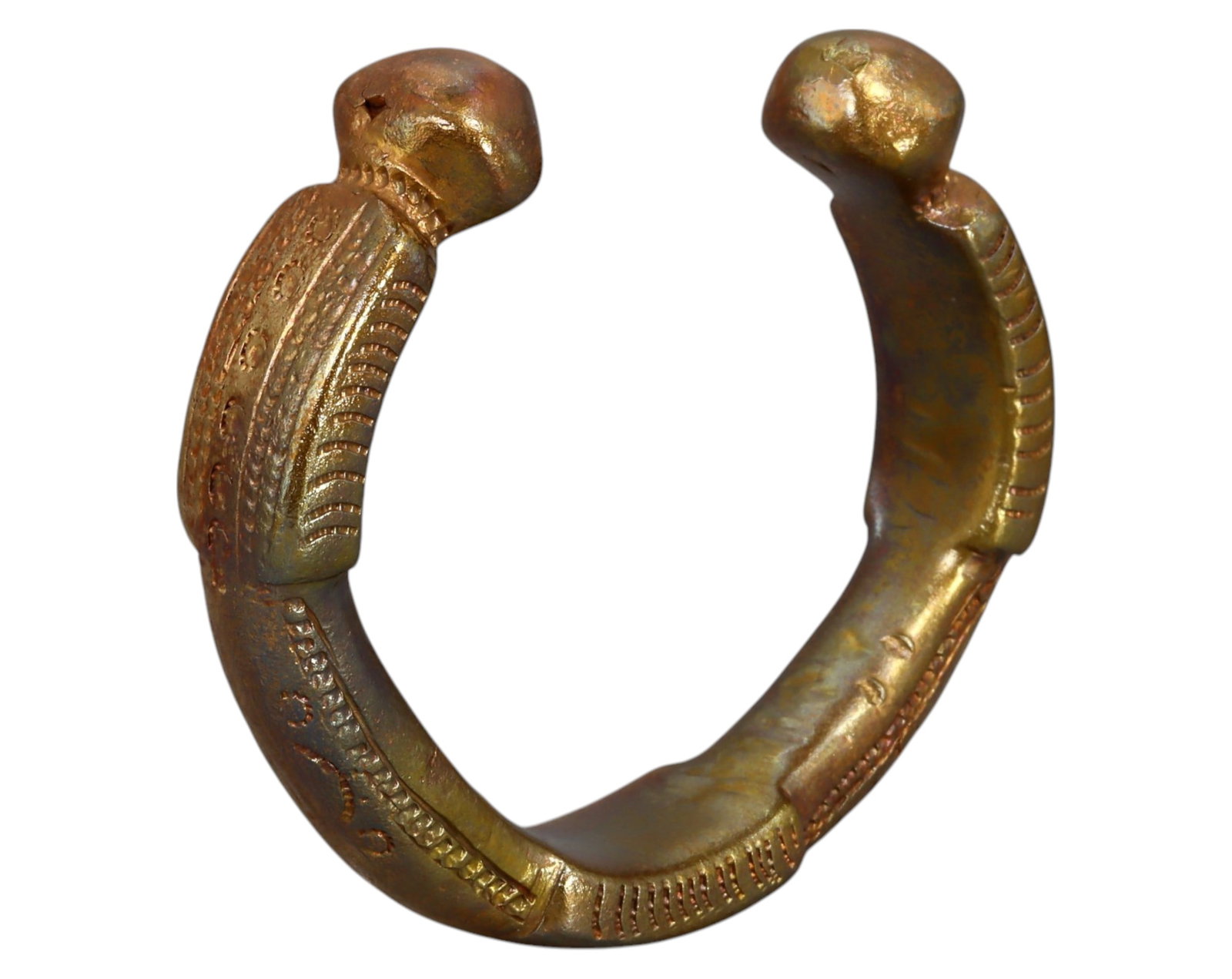 NIGERIA: Queen Manilla - Cast Bronze Currency, 19th-20th Century: A Queen Manilla, cast in bronze, measuring 7 x 1.6 cm and weighing 167g. This piece features a crescent-shaped body with squared-off facets and flared terminals, characteristic of high-value ceremonia