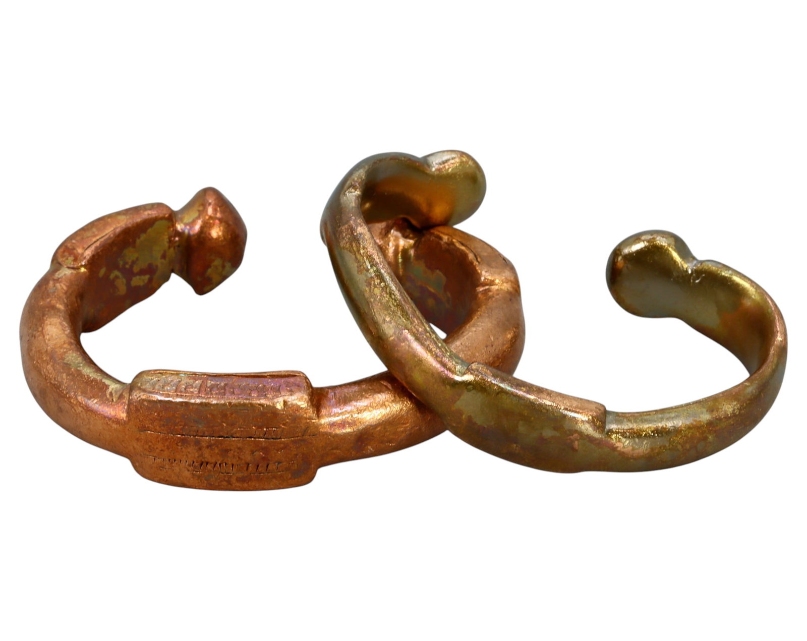 NIGERIA: Pair of Prince Manillas - Cast Bronze/Copper, 19th-20th Century: A matched pair of Prince Manillas, the smallest and lightest category of traditional West African metal currency. Each piece measures 6-6.5 cm in diameter and together weigh 166g. Cast in bronze or co