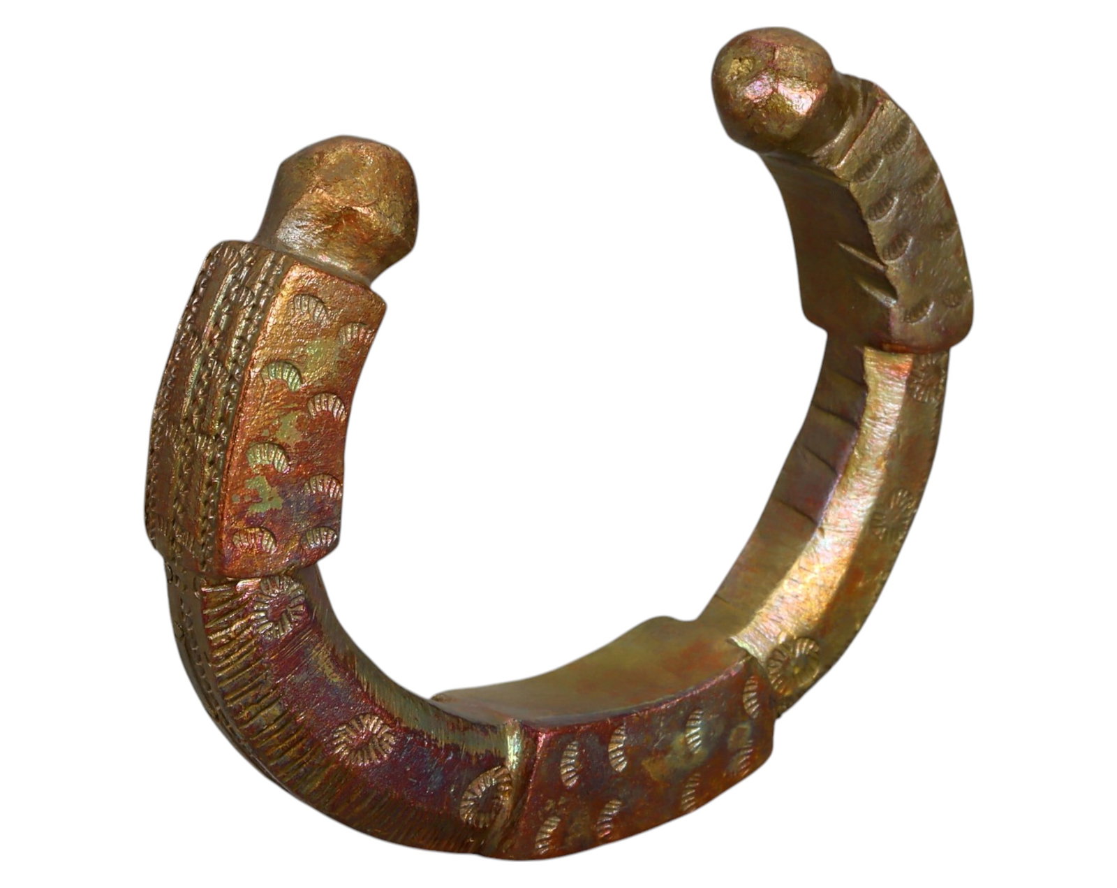 NIGERIA: Queen Manilla - Faceted Bronze Currency, 19th-20th Century: An exceptionally ornate Queen Manilla, crafted in bronze, measuring 8 x 1.2 cm and weighing 190g. This piece is distinguished by its rectangular faceted body with elaborate geometric engravings, inclu