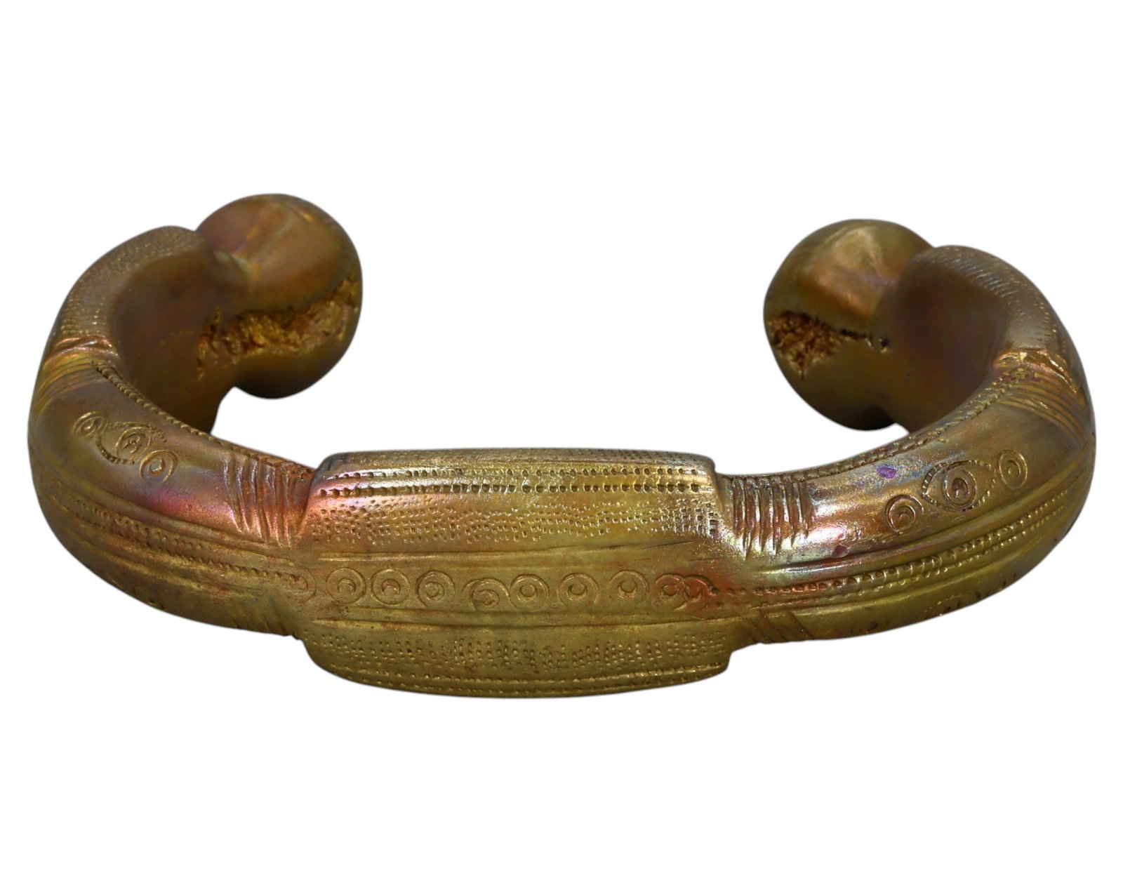 NIGERIA: King Manilla - Heavy Bronze Prestige Currency, 19th-20th Century: A large and finely decorated King Manilla, cast in bronze, measuring 9 x 2 cm and weighing 286g. This piece showcases a crescent-shaped body with thick, swollen terminals, typical of high-value ceremo