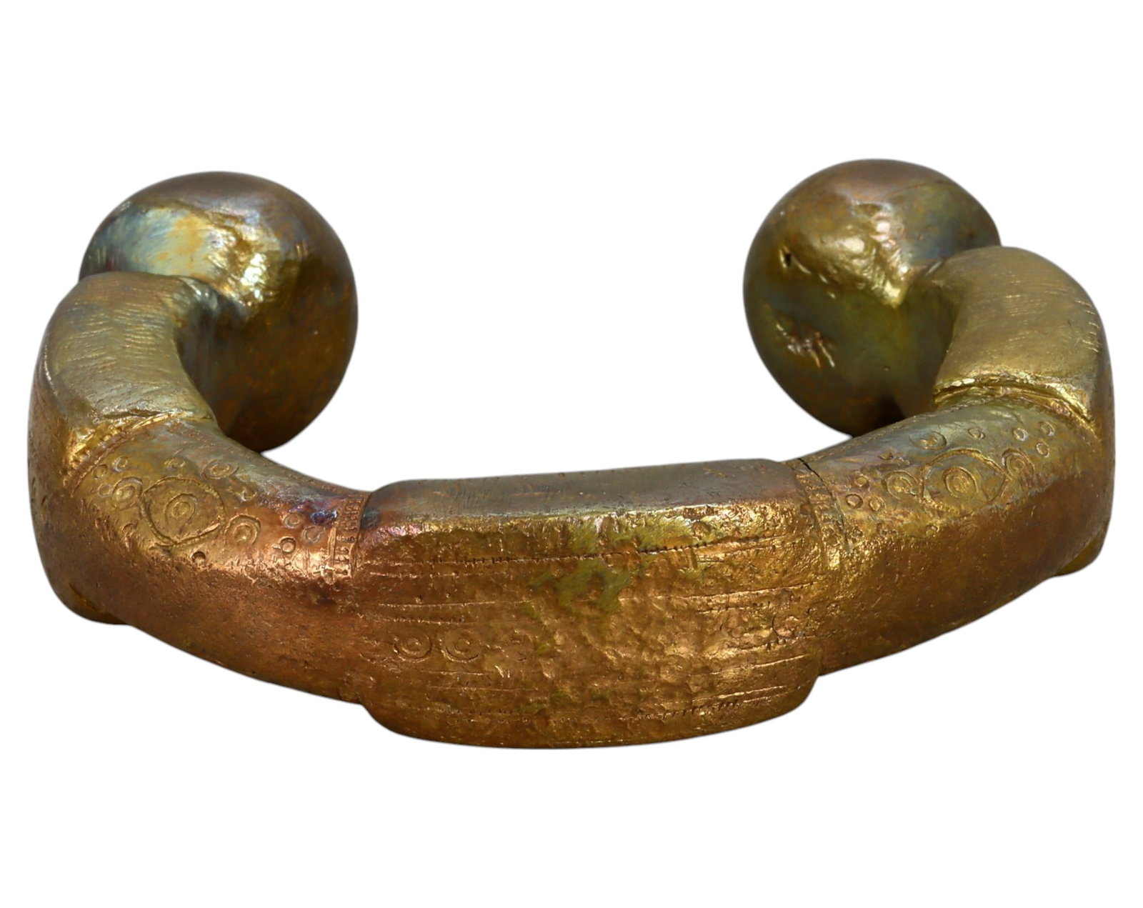 NIGERIA: King Manilla - Heavy Bronze Prestige Currency, 19th-20th Century: A substantial and finely decorated King Manilla, cast in bronze, measuring 9 x 2 cm and weighing 451g. This piece features a thick, crescent-shaped body with prominent, rounded terminals, indicative o