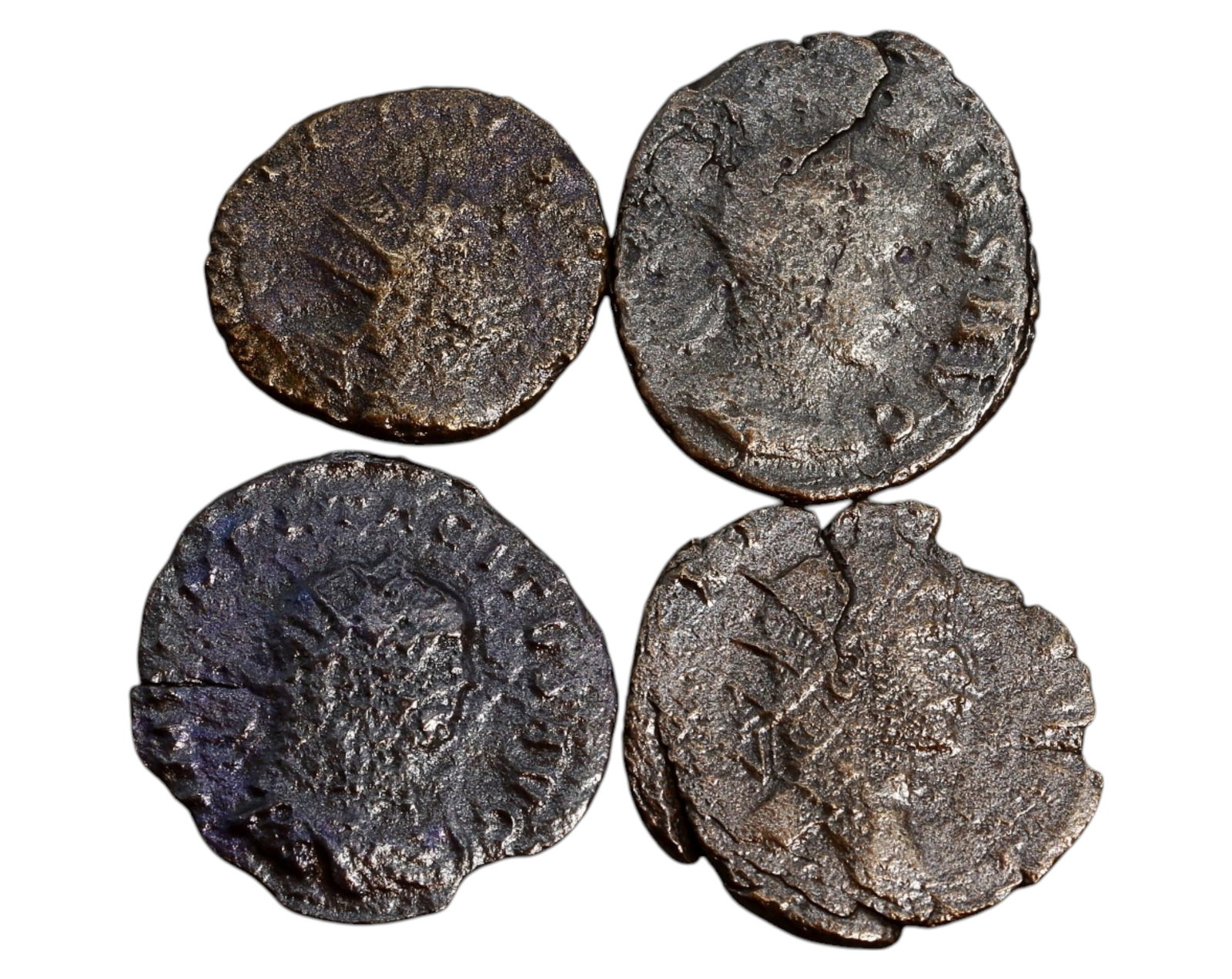 ROMAN EMPIRE: Lot of 4 Antoninianus - Various Emperors, 3rd Century AD: A group of four Roman antoninianus coins, each measuring between 1.6-2cm and collectively weighing 7.4g. These silver-washed bronze coins were issued during the Crisis of the Third Century, a period m