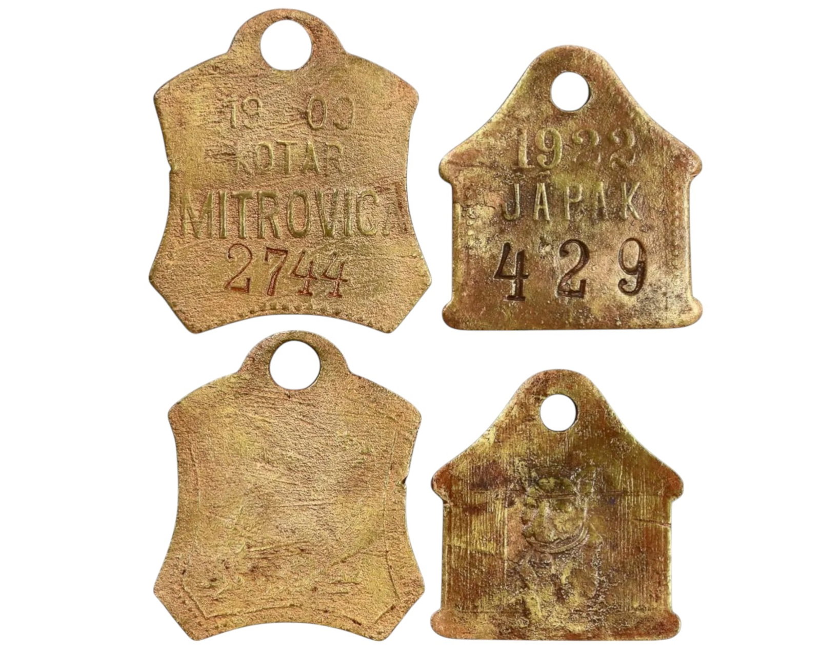 EARLY 20TH CENTURY: Pair of Brass Municipal Tax Tags, 1909-1922 (16g, 3.5-3 cm, 2 pcs): This intriguing pair of brass municipal tax tags reflects local governance and administrative practices in the early 20th century. One tag, marked "KOTAR MITROVICA 1909," is linked to the historical M