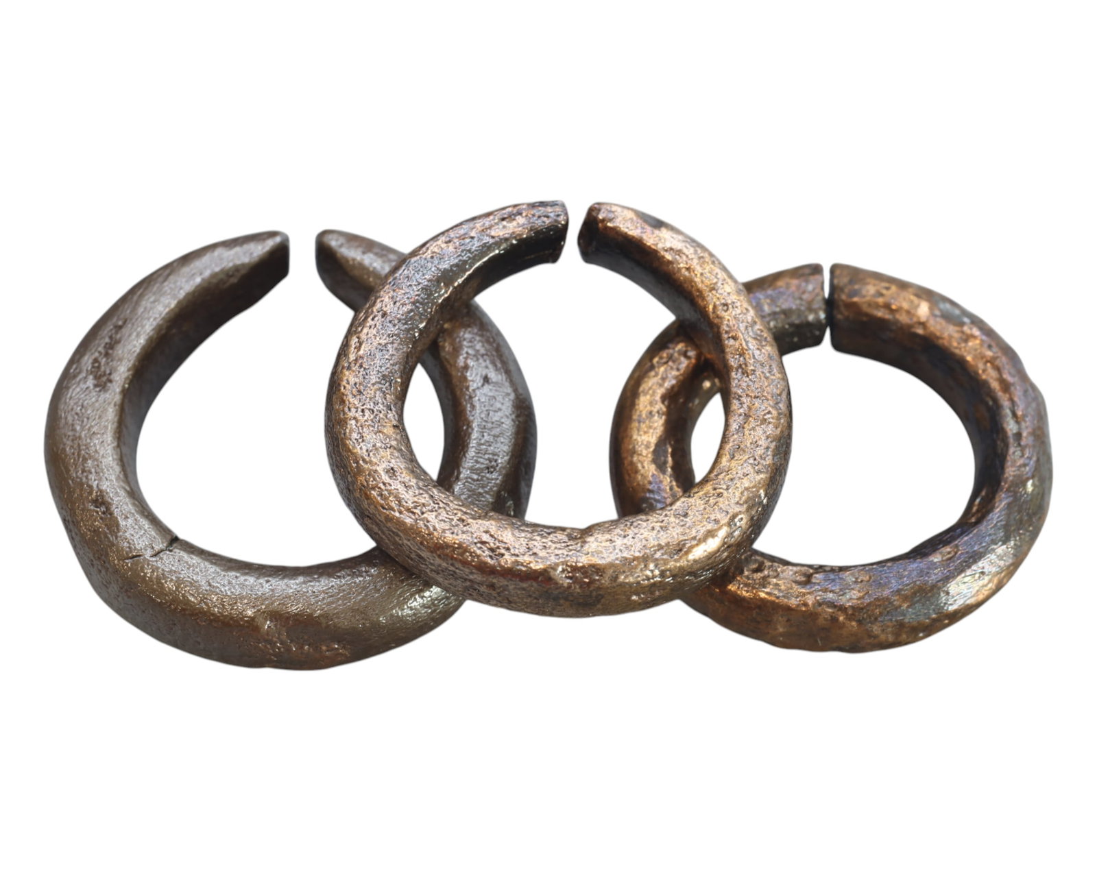 CELTIC PROTO-RING CURRENCY - Bronze, 3 Pieces, 2.8-3.1cm, 54g: A trio of ancient-style Celtic proto-ring currency pieces, each measuring 2.8-3.1 cm in diameter and collectively weighing 54g. These distinctive open-ended bronze rings, exhibiting a rich patina and 