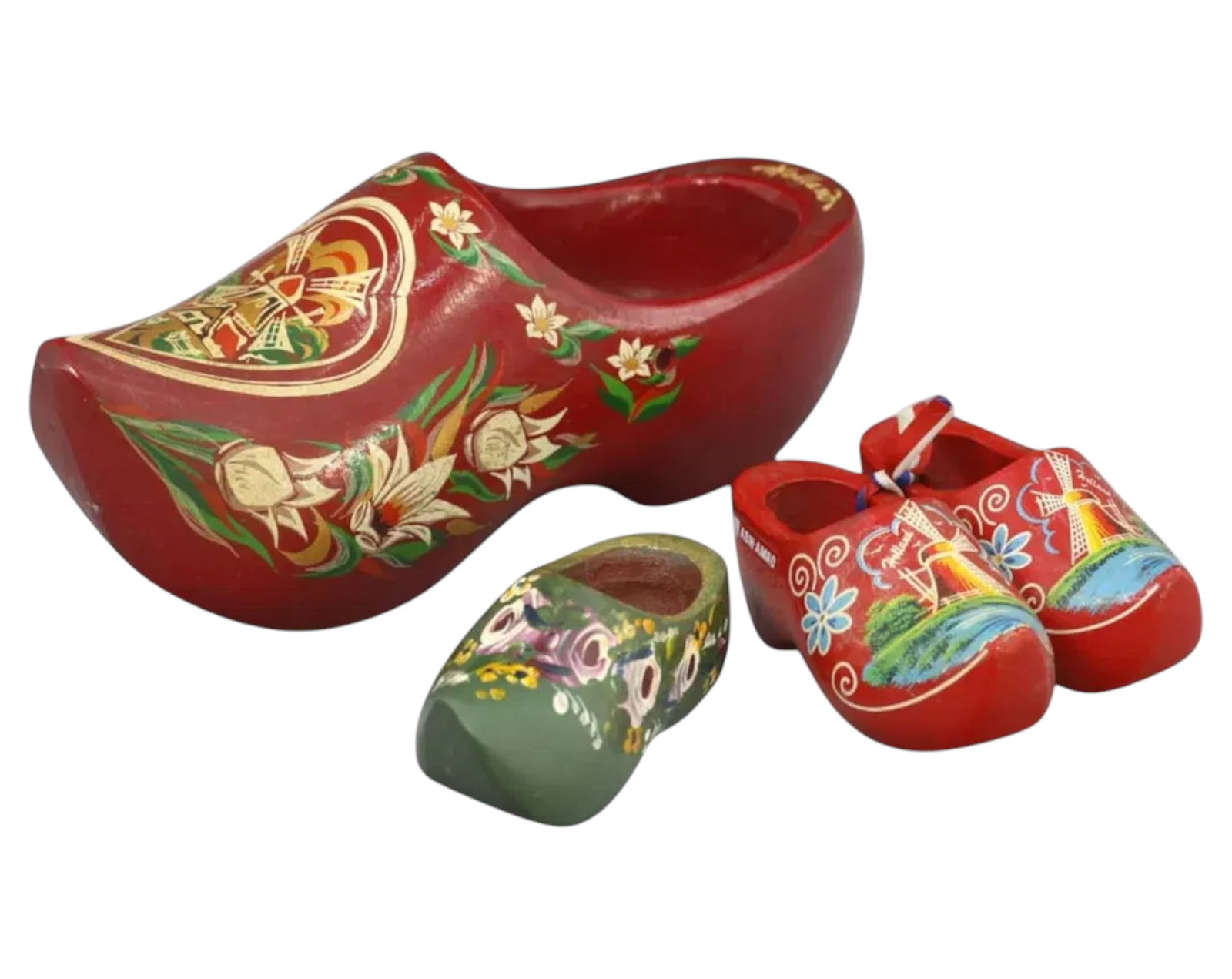 DUTCH-STYLE HAND-PAINTED WOODEN CLOGS: Set of 4 (203g, 8-17cm): This charming set features four hand-painted wooden clogs, each adorned with vibrant floral motifs and traditional Dutch windmill designs. The assortment includes clogs of varying sizes, showcasing in