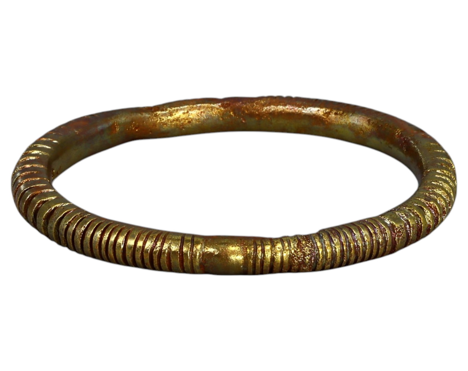 WEST AFRICA: Edo-Benin Kingdom Brass Currency Manilla, c. 16th-19th Century: A rare and historically significant brass manilla currency piece from the Edo-Benin Kingdom, measuring 7.3cm in diameter and weighing 63g. Featuring a rounded form with incised linear markings along t