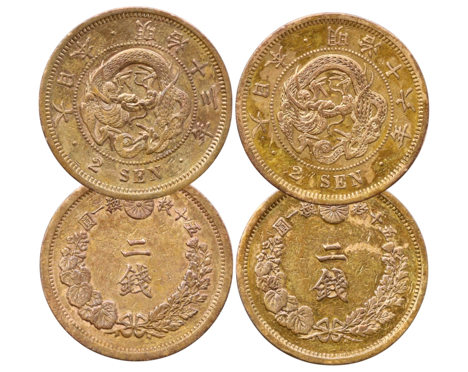JAPAN: Lot of 2 Bronze 2 Sen Coins - Meiji Era, 1880 & 1883: A pair of Japanese 2 Sen bronze coins from the Meiji period, dated Year 13 (1880) and Year 16 (1883). Each coin weighs approximately 14g, with a diameter of 3cm, displaying the iconic imperial dragon 