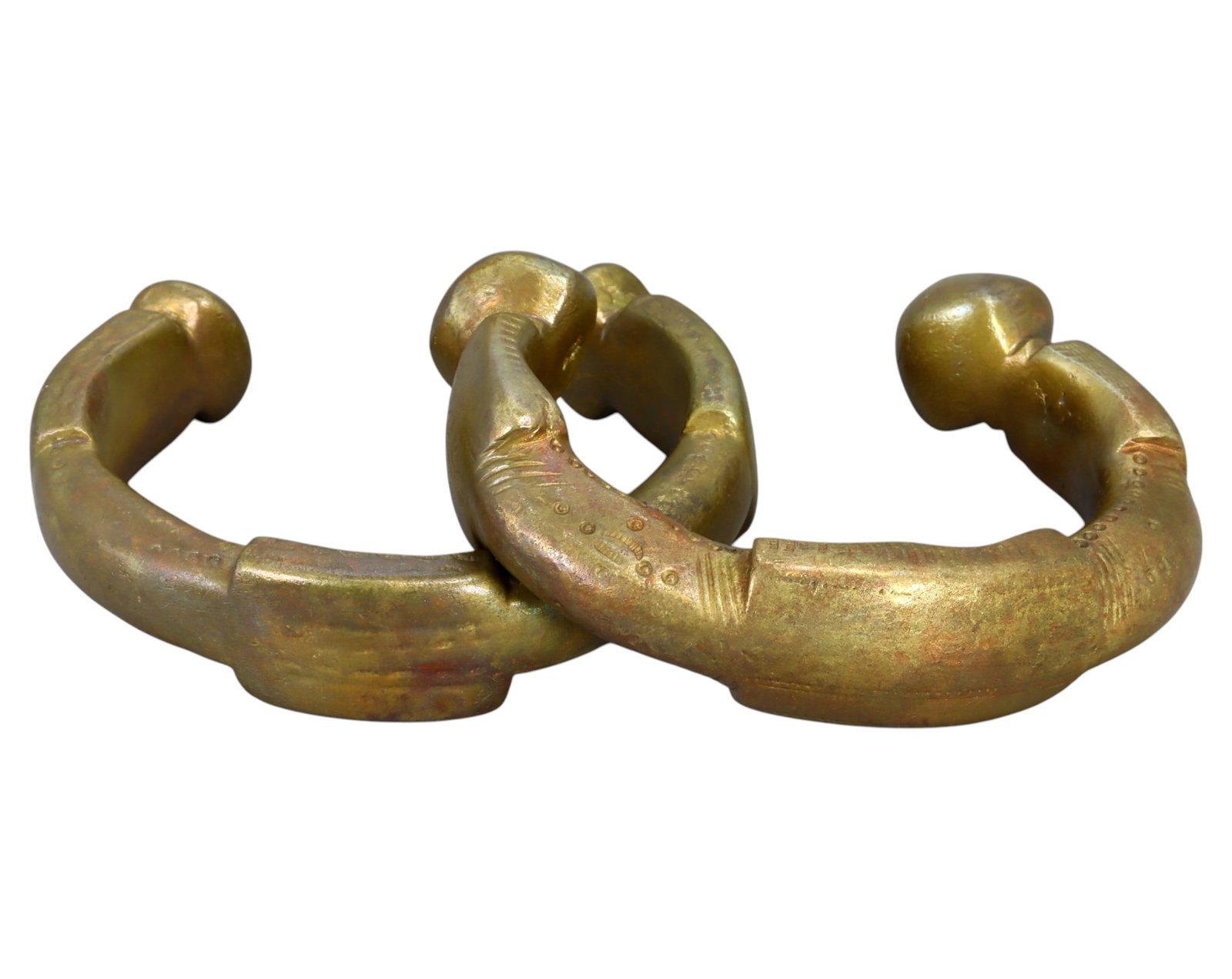 NIGERIA: Pair of King Manillas - Heavy Bronze Prestige Currency, 19th-20th Century: A matched pair of King Manillas, cast in bronze, measuring 8.2 - 8.7 cm in diameter with a combined weight of 491g. These substantial pieces feature thick crescent-shaped bodies with bold, swollen ter