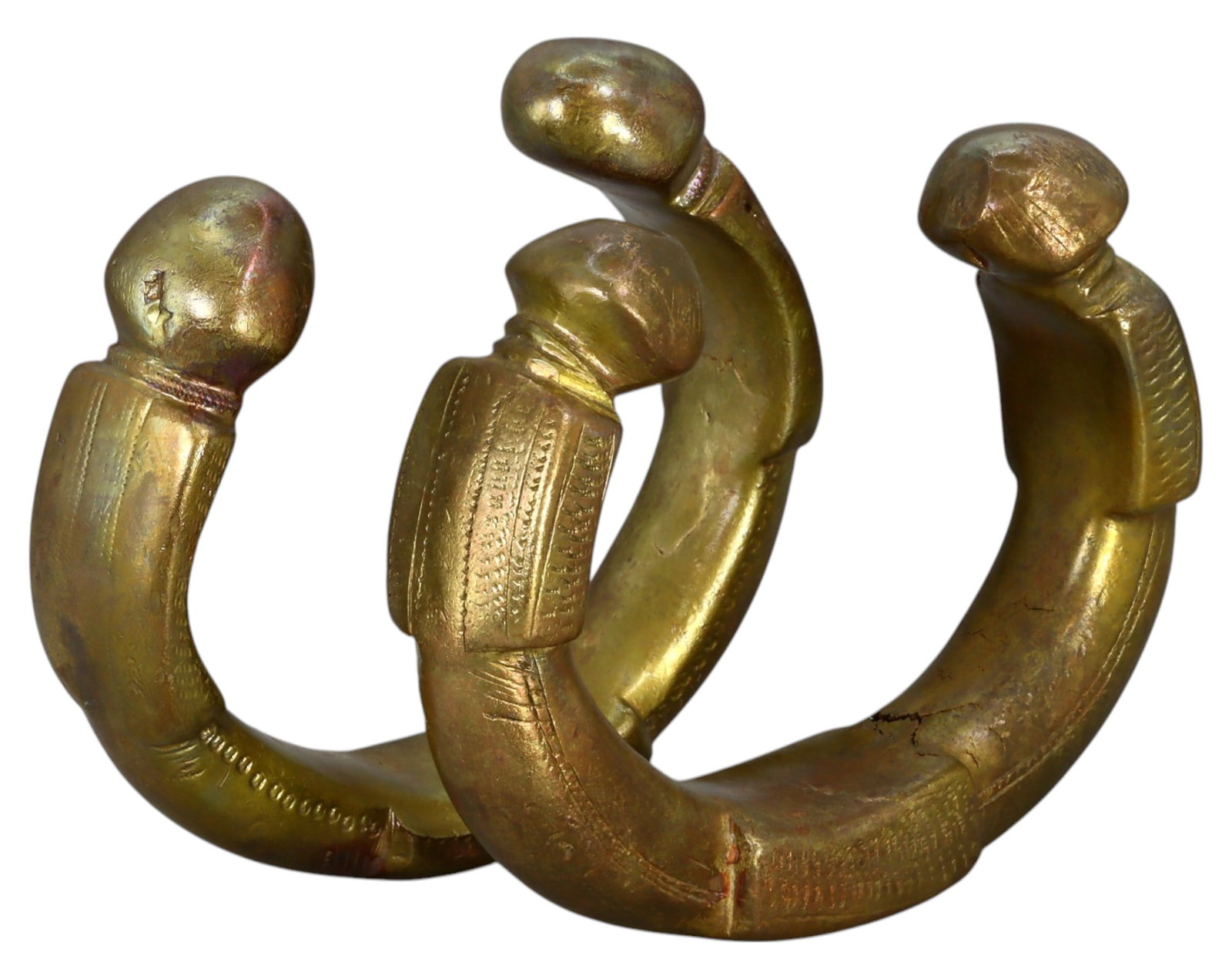 NIGERIA: Pair of King Manillas - Heavy Bronze Prestige Currency, 19th-20th Century: A matched pair of King Manillas, cast in bronze, measuring 8.4 - 8.6 cm in diameter with a combined weight of 610g. These substantial pieces feature thick crescent-shaped bodies with bold, swollen ter