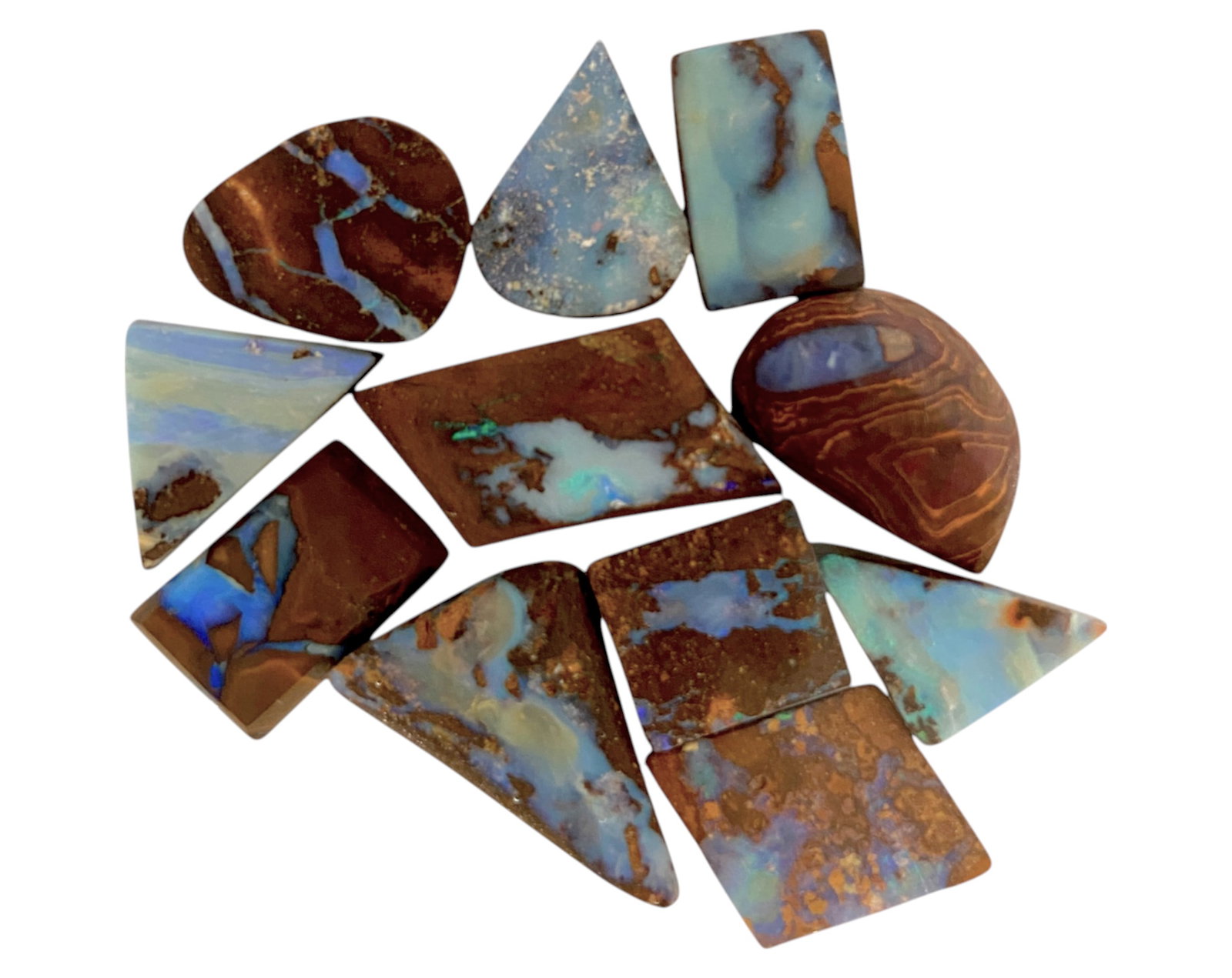 AUSTRALIAN MATRIX BOULDER OPAL - Preform Rough Lot, 11 Pieces, 17g, 11-24mm (Images Taken Wet): A dazzling lot of preform Australian matrix boulder opals, with individual sizes. These opals have been rubbed and pre-shaped, highlighting their vibrant natural colors and intricate ironstone matrix 