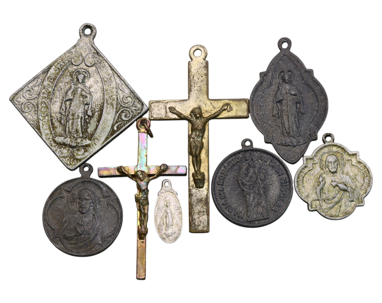 SPAIN/ITALY: Marian Devotional Medals & Crucifix Lot - Sacred Heart & Our Lady, (8pcs): A striking collection of eight religious medals and crucifixes, showcasing intricate Catholic devotion. Ranging from 2cm to 6cm and weighing 25g, 19th-20th Century this set includes beautifully cast d
