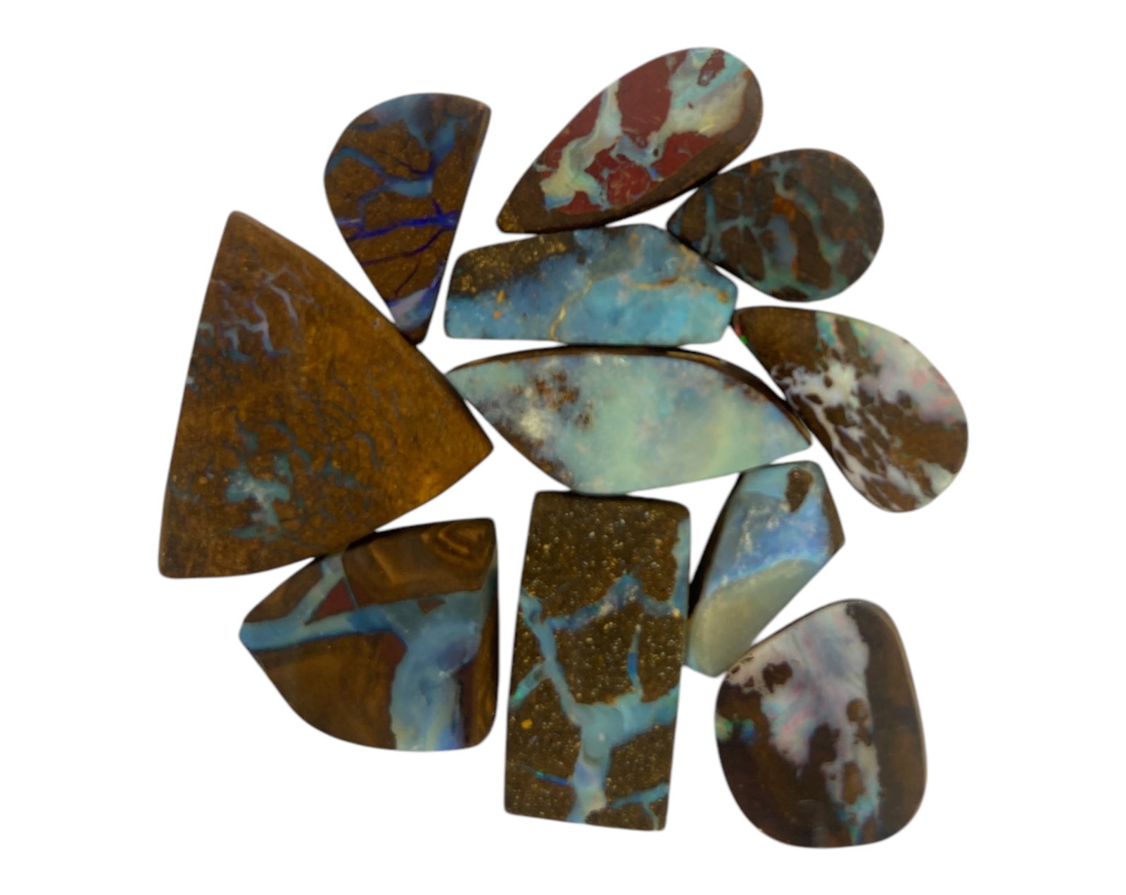 AUSTRALIAN MATRIX BOULDER OPAL - Preform Rough Lot, 11 Pieces, 12.4g, 11-18.9mm (Images Taken Wet): A dazzling lot of preform Australian matrix boulder opals, with individual sizes. These opals have been rubbed and pre-shaped, highlighting their vibrant natural colors and intricate ironstone matrix 