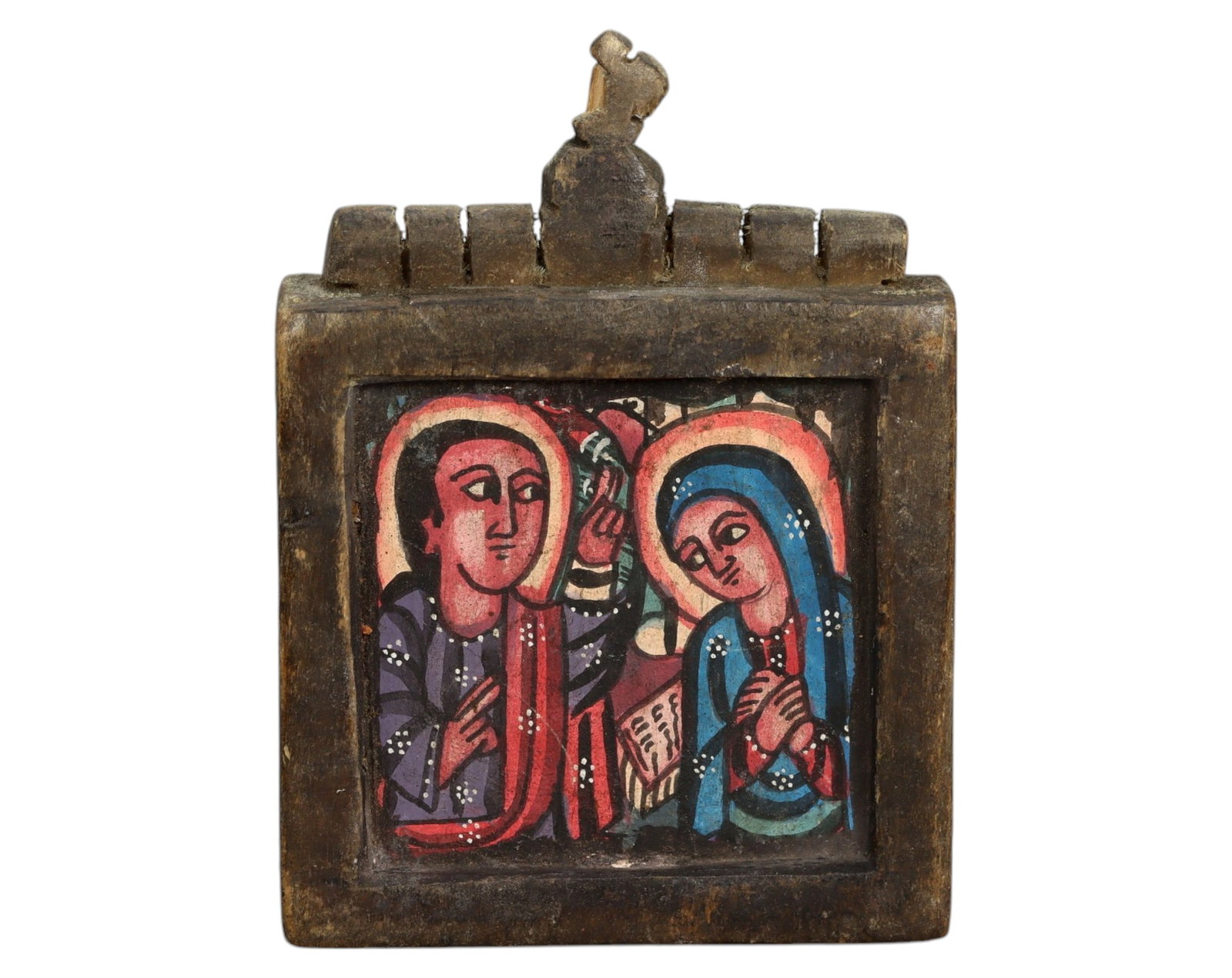 ETHIOPIA: Hand-Painted Diptych Icon - Wood & Pigment, 9x6.5cm, 21g: A remarkable Ethiopian Orthodox diptych icon, hand-painted with vibrant biblical scenes in a traditional wooden frame. The hinged panels depict the Annunciation on one side, with the Virgin Mary recei