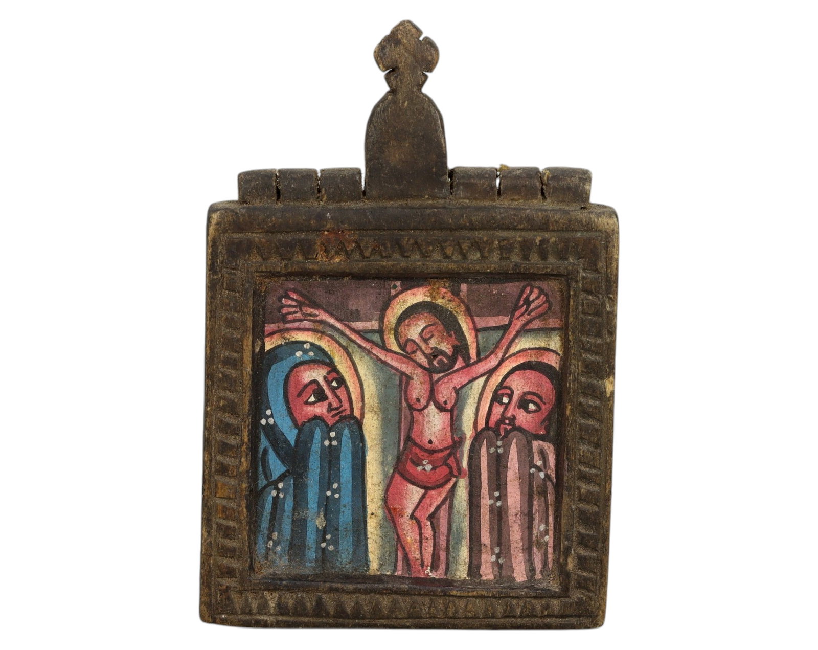 ETHIOPIA: Hand-Painted Diptych Icon - Wood & Pigment, 10.5x7cm, 19g: An exquisite Ethiopian Orthodox diptych icon, featuring vibrant biblical scenes within a delicately carved wooden frame. One panel depicts the Crucifixion of Christ, with the sorrowful Virgin Mary and