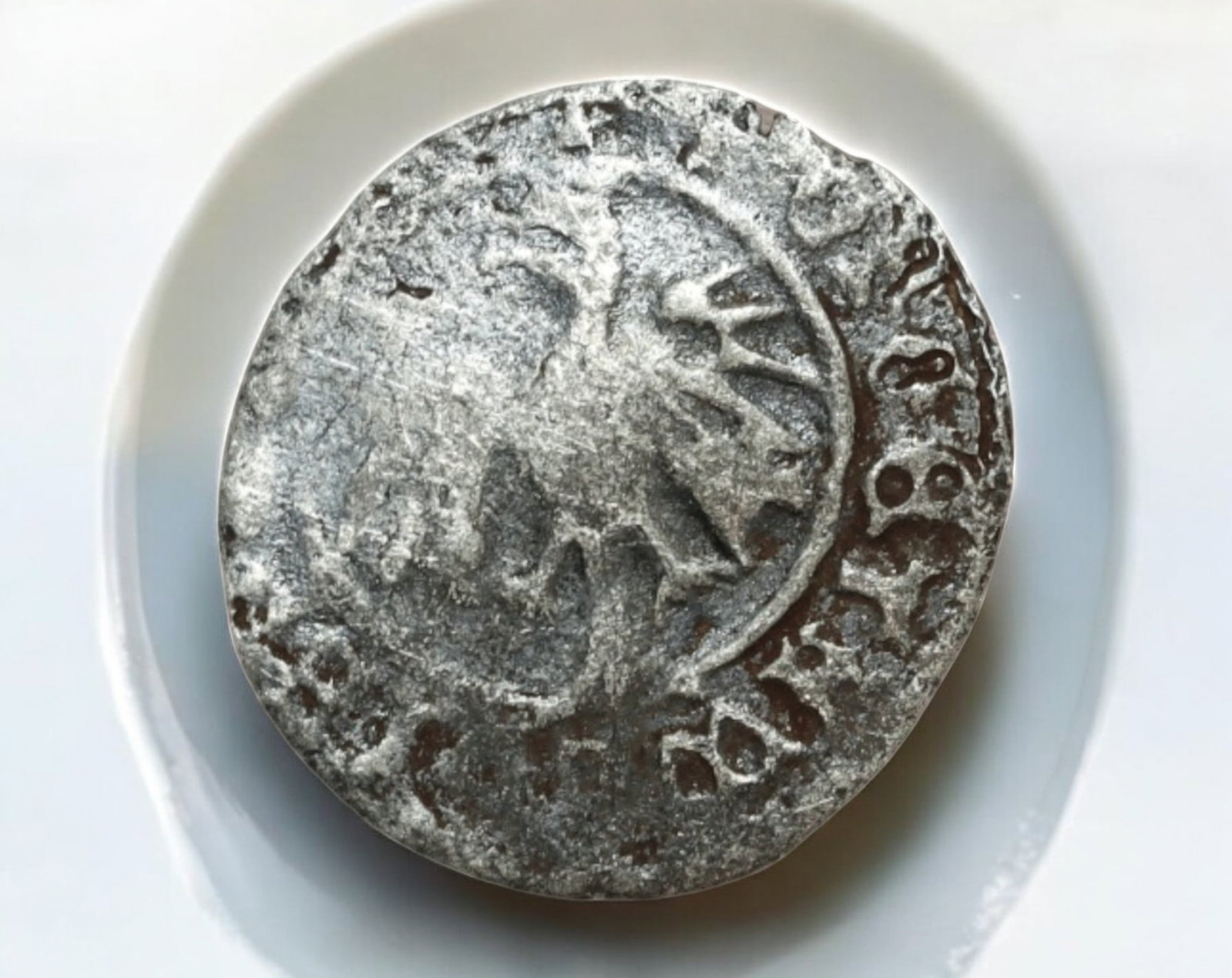 HUNGARY: Ladislaus V Silver Denier - 16mm, 1442-1444: A rare medieval silver Denier struck under Ladislaus V (1444-1453), a significant figure in Hungarian and Austrian history. The obverse features the twofold Hungarian coat of arms, displaying the ?rp?