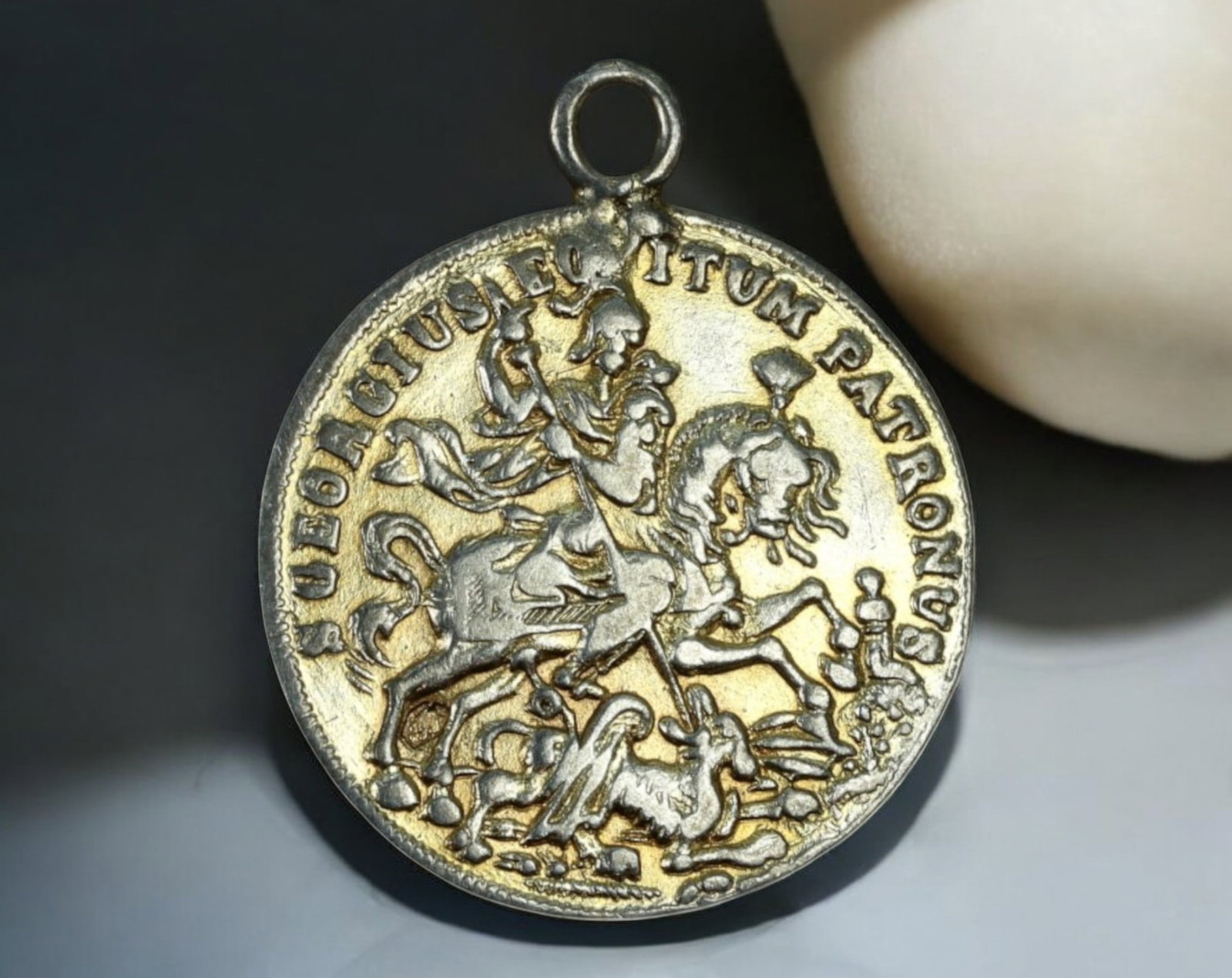 EUROPE: St. George & Tempestate Equitas Medal Coin - 19th Century: A beautifully crafted devotional and maritime protection medal, struck in a bi-metallic composition, measuring 22x27mm and weighing 4.3g. The obverse features a dynamic depiction of St. George slaying