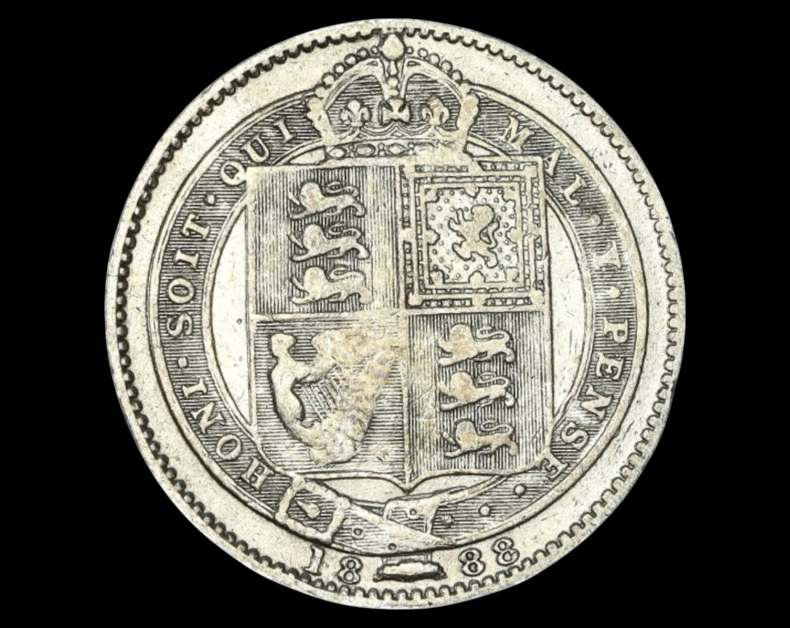 GREAT BRITAIN: Queen Victoria Silver Sixpence Coin - Shield Reverse, 1888: A classic 1888 silver Sixpence Coin of Queen Victoria, struck in .925 sterling silver, measuring 23mm in diameter and weighing 5.4g. The obverse features the mature crowned bust of Queen Victoria, fac