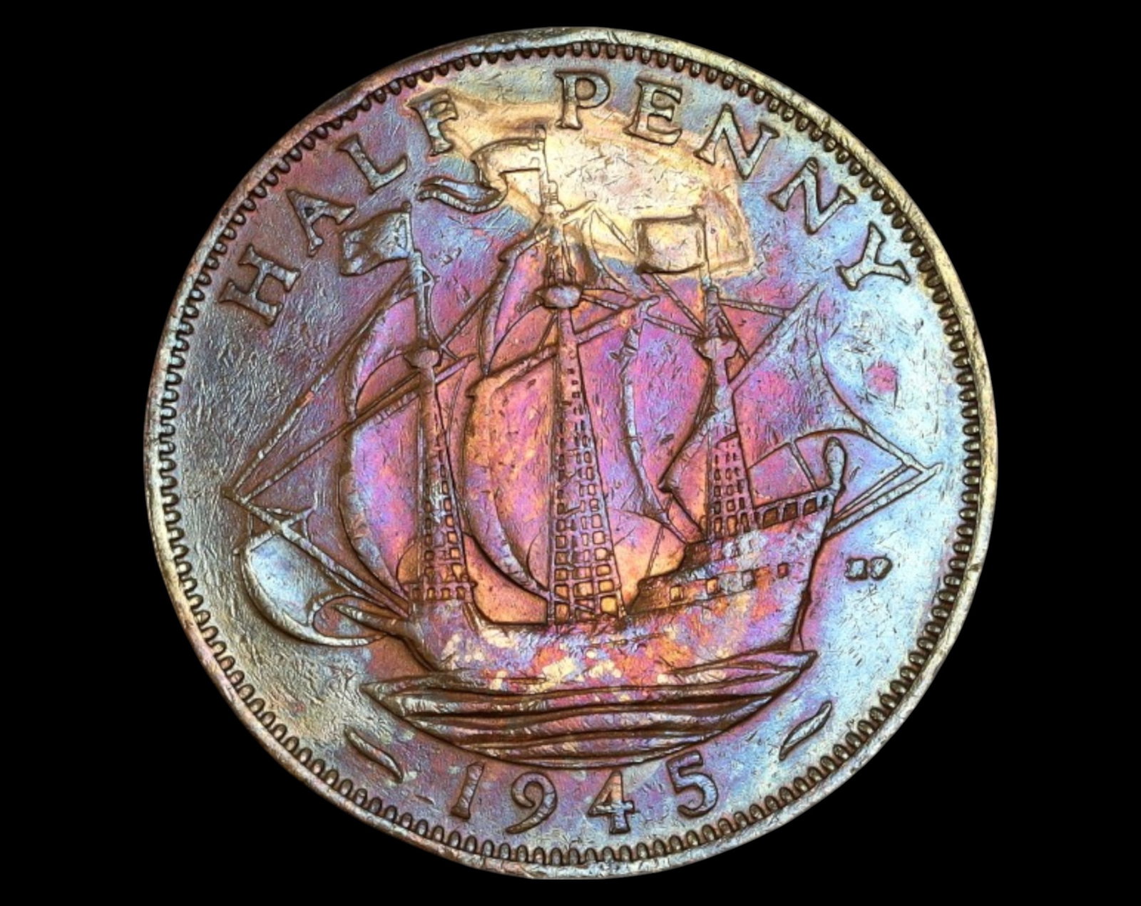 UNITED KINGDOM: George VI Half Penny Coin - 1945, Bronze, 25mm, 5.5g: A well-preserved bronze half Penny Coin from 1945, issued during the reign of King George VI (1936-1952). The obverse features a right-facing portrait of King George VI, encircled by the Latin inscrip