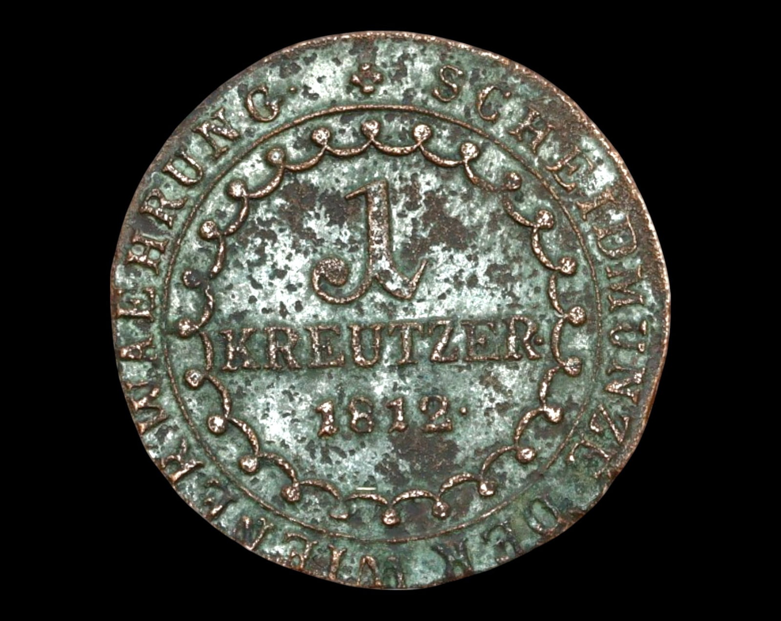 AUSTRIA: Franz I - Copper 1 Kreuzer Coin Coin, 1812 S, Kremnitz Mint: A historically significant 1 Kreuzer Coin struck under Emperor Franz I of Austria in 1812 at the Kremnitz Mint. The obverse features a right-facing bust of Franz I, encircled by his title "FRANZ KAIS 