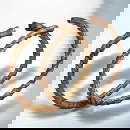 WEST AFRICA: Pair of Twisted Bronze Manilla Currency Bracelets - 7.7-8.2cm, 91g,17th-19th Century