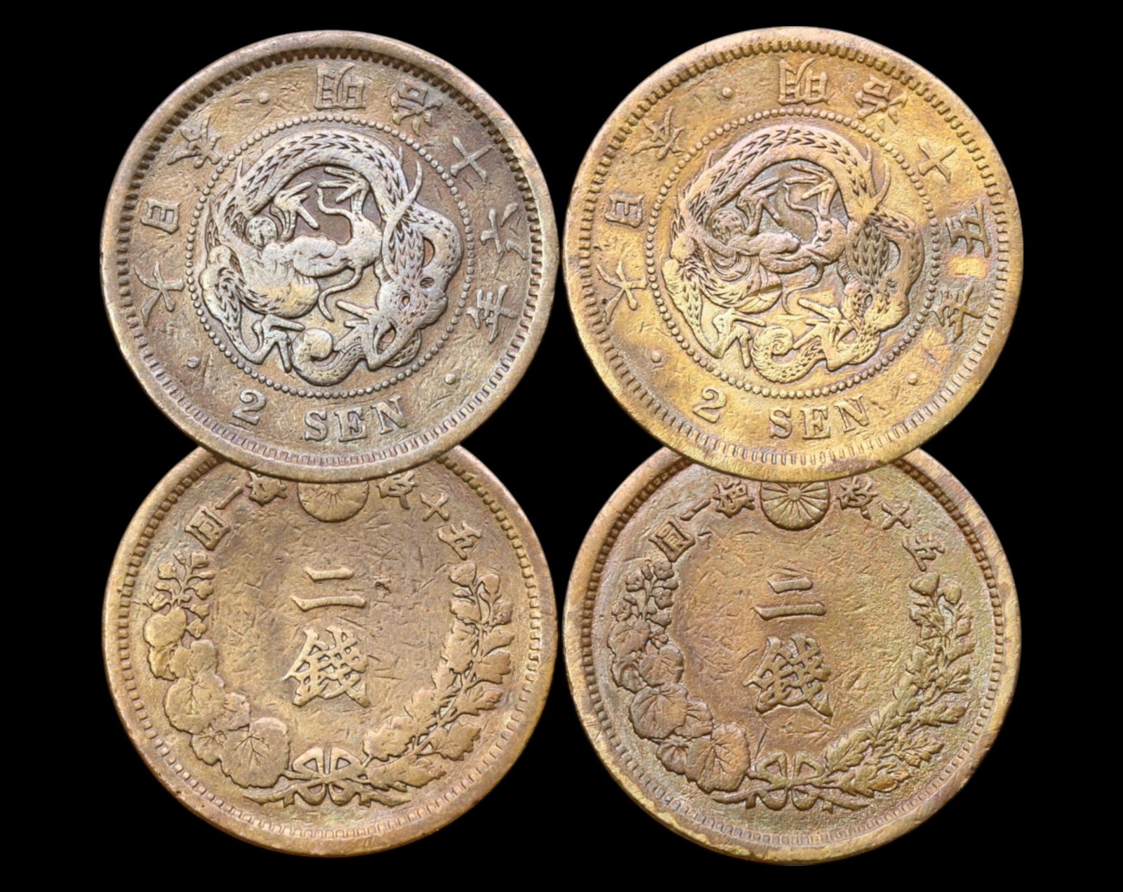JAPAN: Lot of 2 Bronze 2 Sen Coins - Meiji Era, 1882 & 1883: A pair of Japanese 2 Sen bronze coins from the later Meiji period, dated Year 15 (1882) and Year 16 (1883). Each coin weighs a total of 28g and measures 3cm in diameter. The obverse presents a coiled 