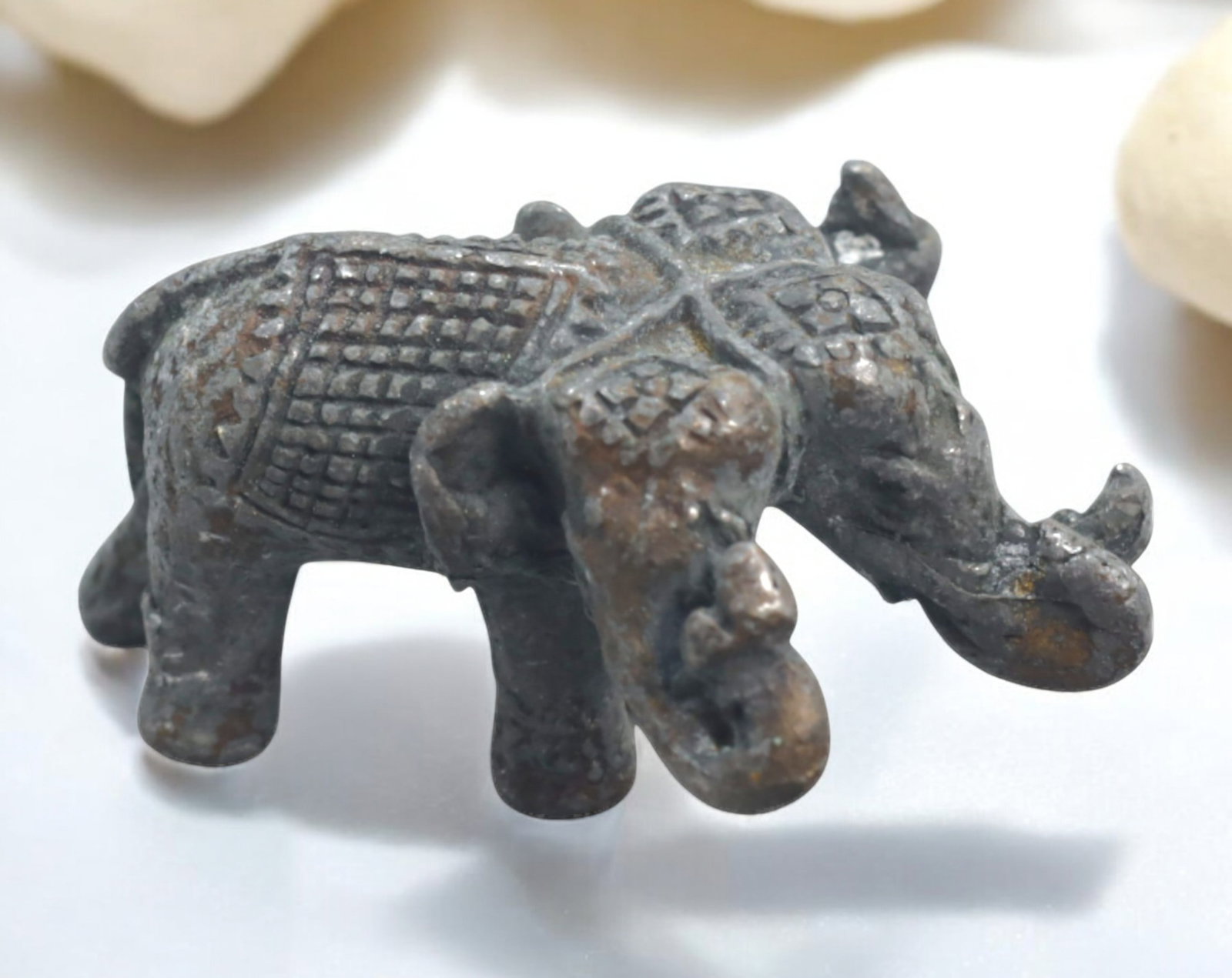 RATTANAKOSIN: Erawan (Airavata) Three-Headed Elephant Figurine - 61g, 4.5x2.5cm (1782-1932): A finely crafted figurine depicting Erawan, the mythological three-headed elephant associated with the Hindu god Indra, measuring 4.5x2.5cm and weighing 61g. This piece showcases intricate detailing c