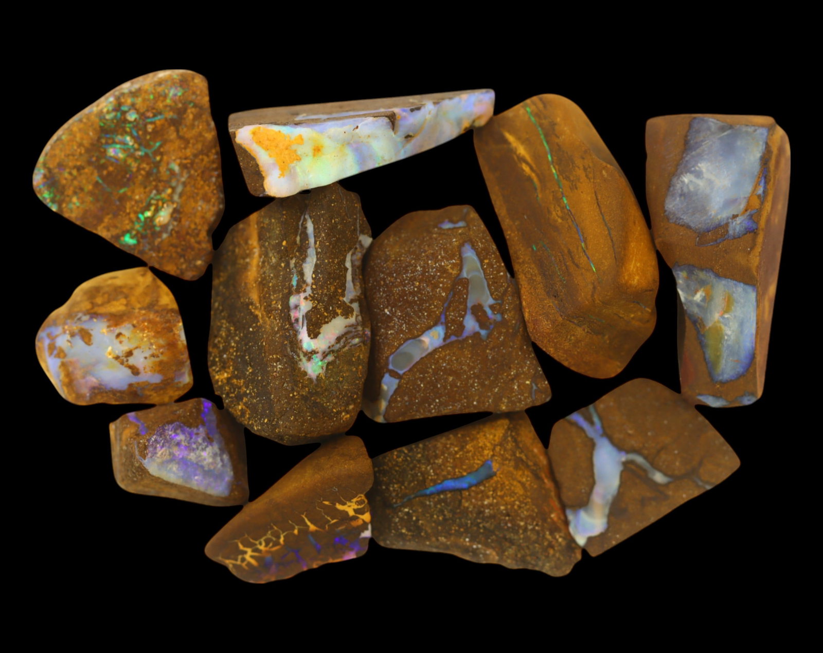 AUSTRALIA: Matrix Boulder Opal Rough Lot, 47g, 1-2.5 cm (Images Taken Wet): Stunning lot of natural Australian matrix boulder opal rough, these specimens showcase a vibrant interplay of opalized veins and swirls embedded in rich ironstone, displaying flashes of electric blues