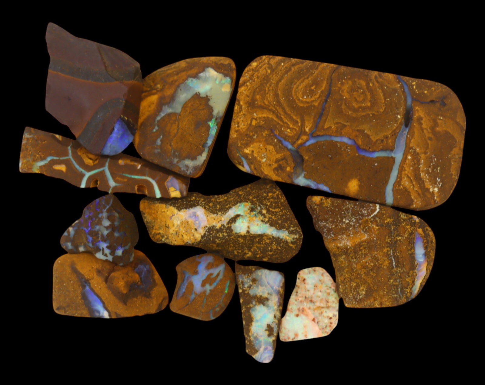 AUSTRALIA: Matrix Boulder Opal Rough Lot, 34g, 1-3.6 cm (Images Taken Wet): Stunning lot of natural Australian matrix boulder opal rough, these specimens showcase a vibrant interplay of opalized veins and swirls embedded in rich ironstone, displaying flashes of electric blues