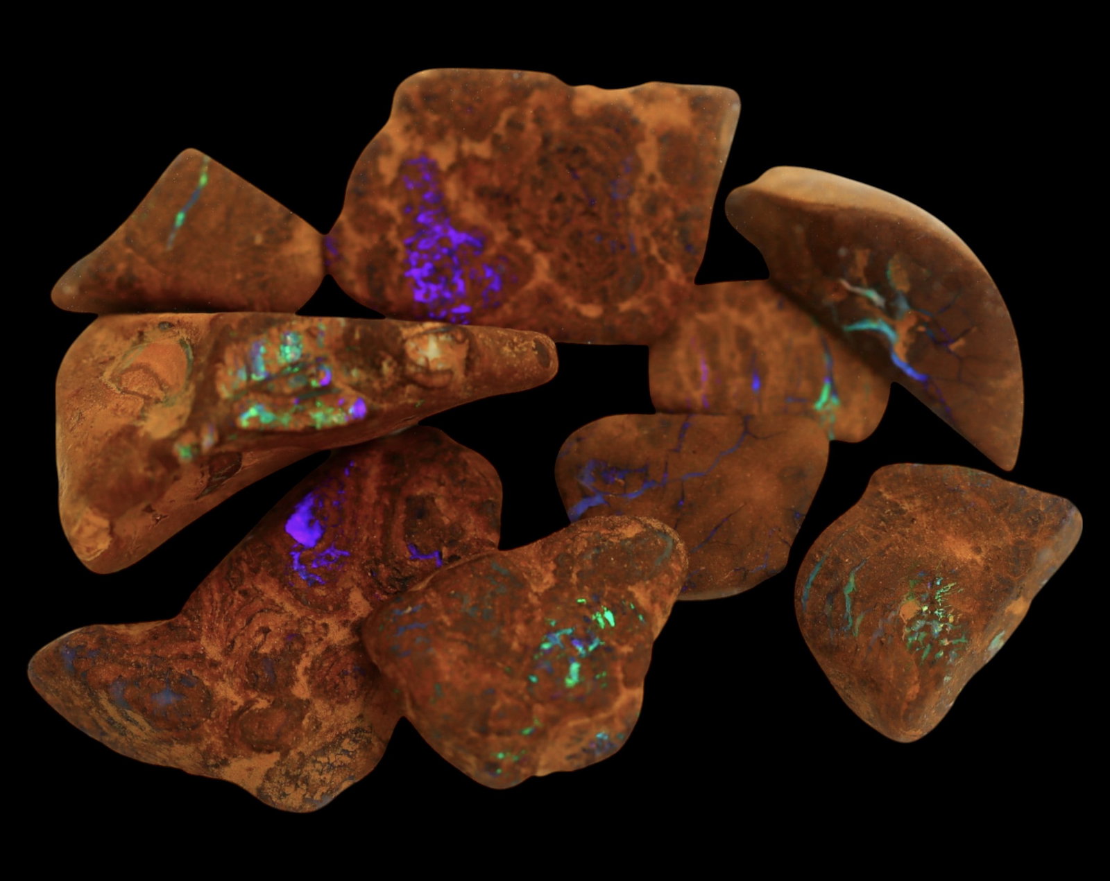 AUSTRALIAN MATRIX BOULDER OPAL - Rough Lot, 1.5-3cm, 28g: A striking lot of natural Australian matrix boulder opal rough. These raw specimens display mesmerizing flashes of blue, green, and gold veins running through ironstone, characteristic of high-quality