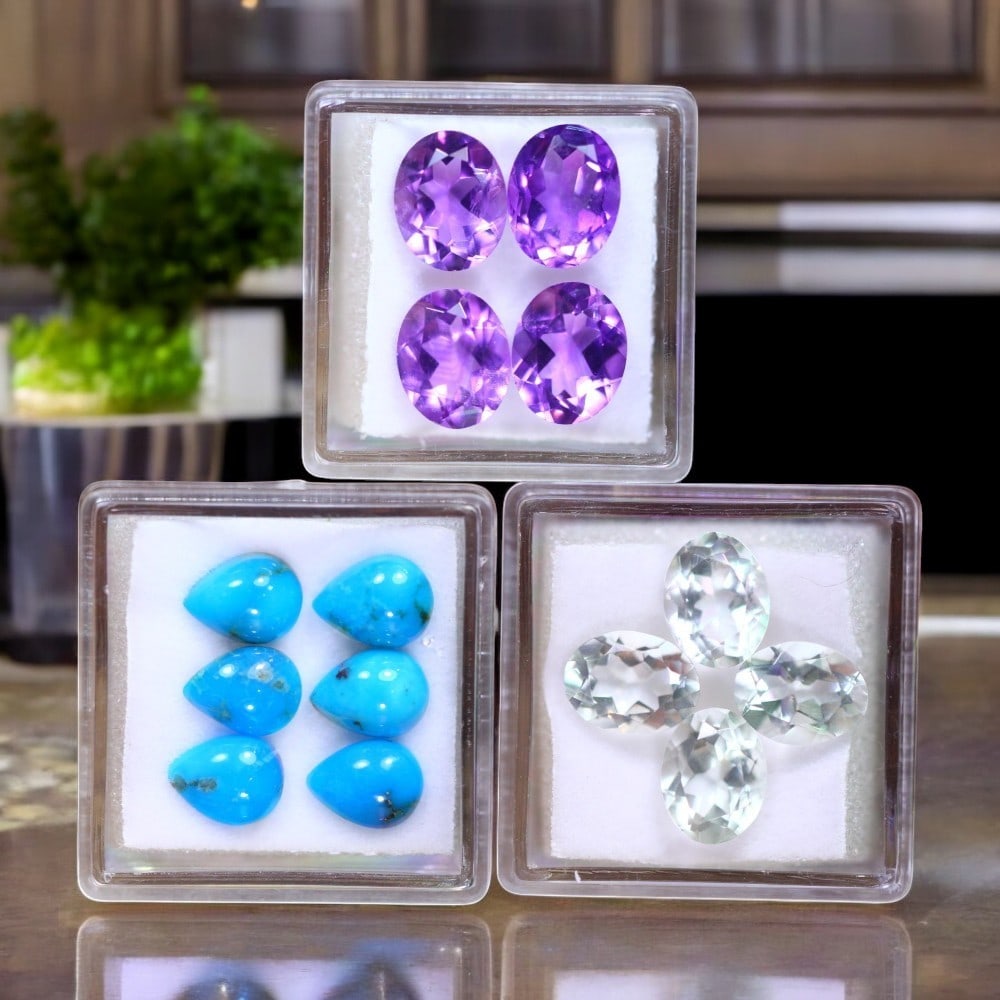 Amethyst, Arizona Turquoise & Green Amethyst: A refined selection of natural gemstones showcasing vibrant hues and exceptional clarity. This collection includes four oval-cut Amethysts, totaling 10.15 carats (10.1x8.0x5.4mm each), displaying a ri