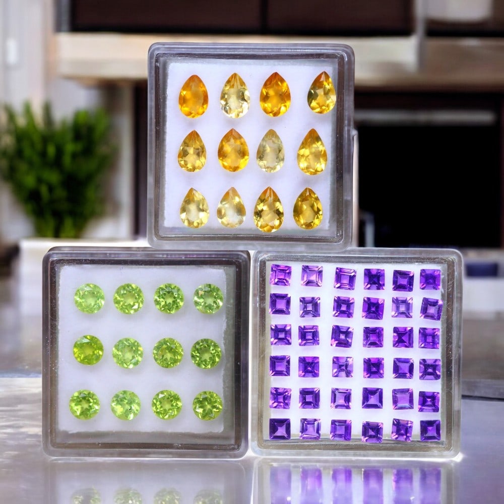 Amethyst, Citrine & Peridot: An exceptional selection of finely cut gemstones, featuring a stunning variety of colors and brilliance. This collection includes thirty-six square-cut Amethysts, totaling 3.39 carats (2.7x2.6x1.9mm e