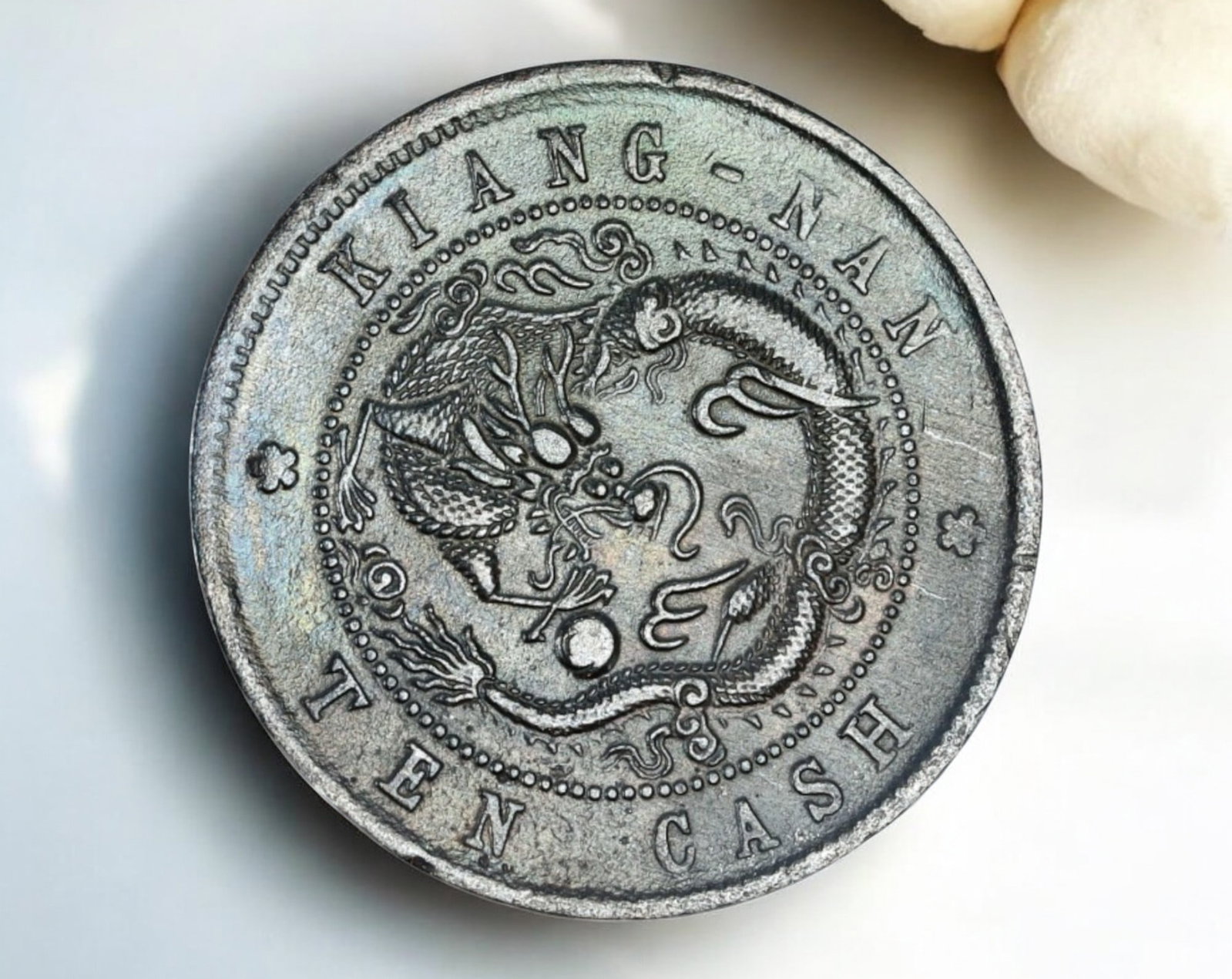 CHINA: Kiangnan 10 Cash Coin - Guangxu Year 1904, Jiangsu Province, Late Qing Dynasty: A well-preserved 10 Cash Coin copper coin from Kiangnan (Jiangsu) Province, minted in the Guangxu 30th year (1904) of the Qing Dynasty. Measuring 28mm in diameter and weighing 7.1g, this coin reflects