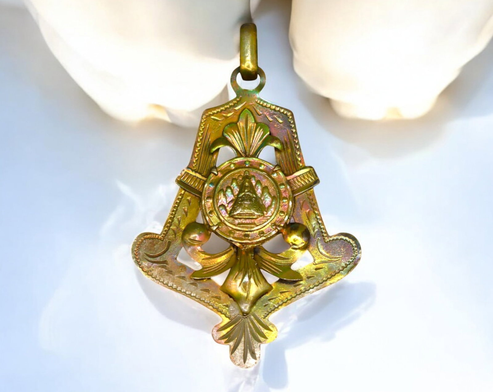 SPAIN: Montserrat Sanctuary Devotional Medal - Brass, Early 20th Century: An ornate devotional medal dedicated to the Sanctuary of Montserrat, one of Spain's most revered religious sites. Struck in brass, measuring 3.1x4.3 cm and weighing 4g, this intricately designed penda